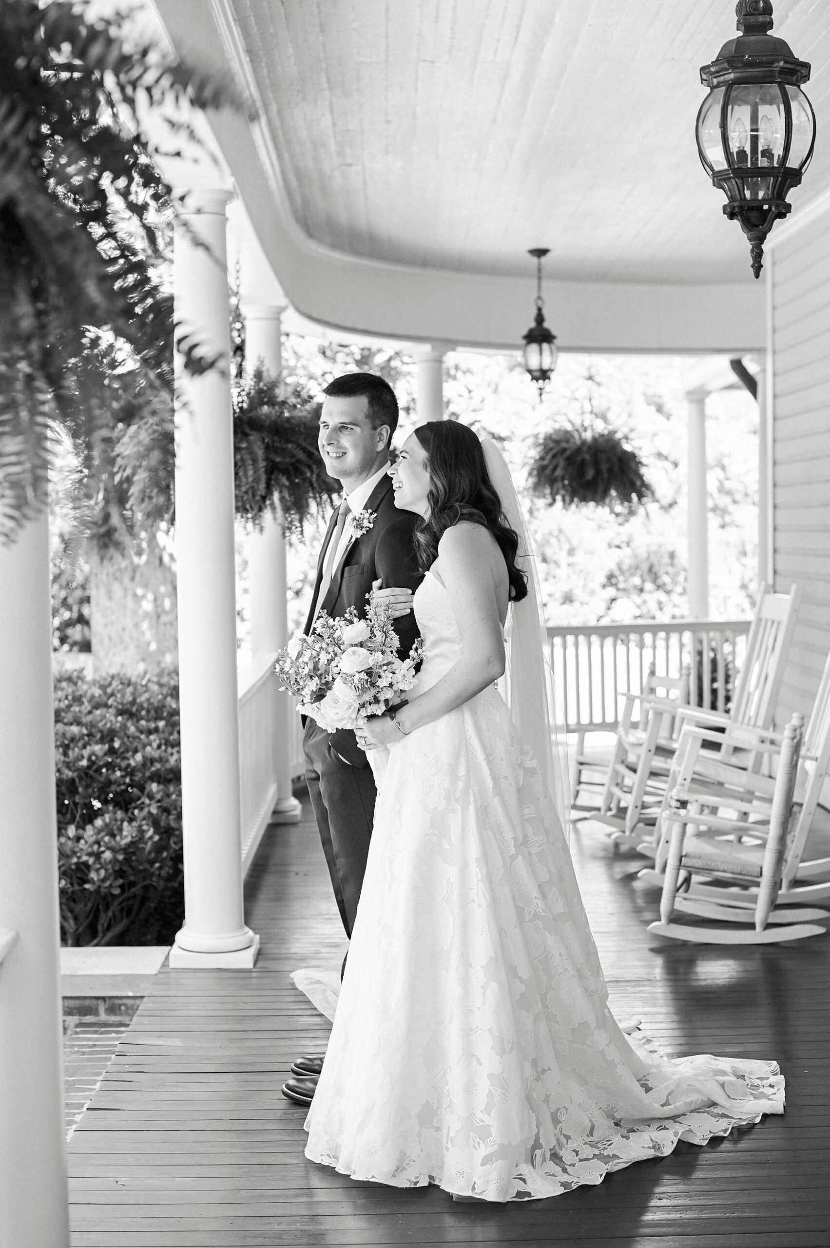 bride and father walk down porch steps at Alexander Homestead