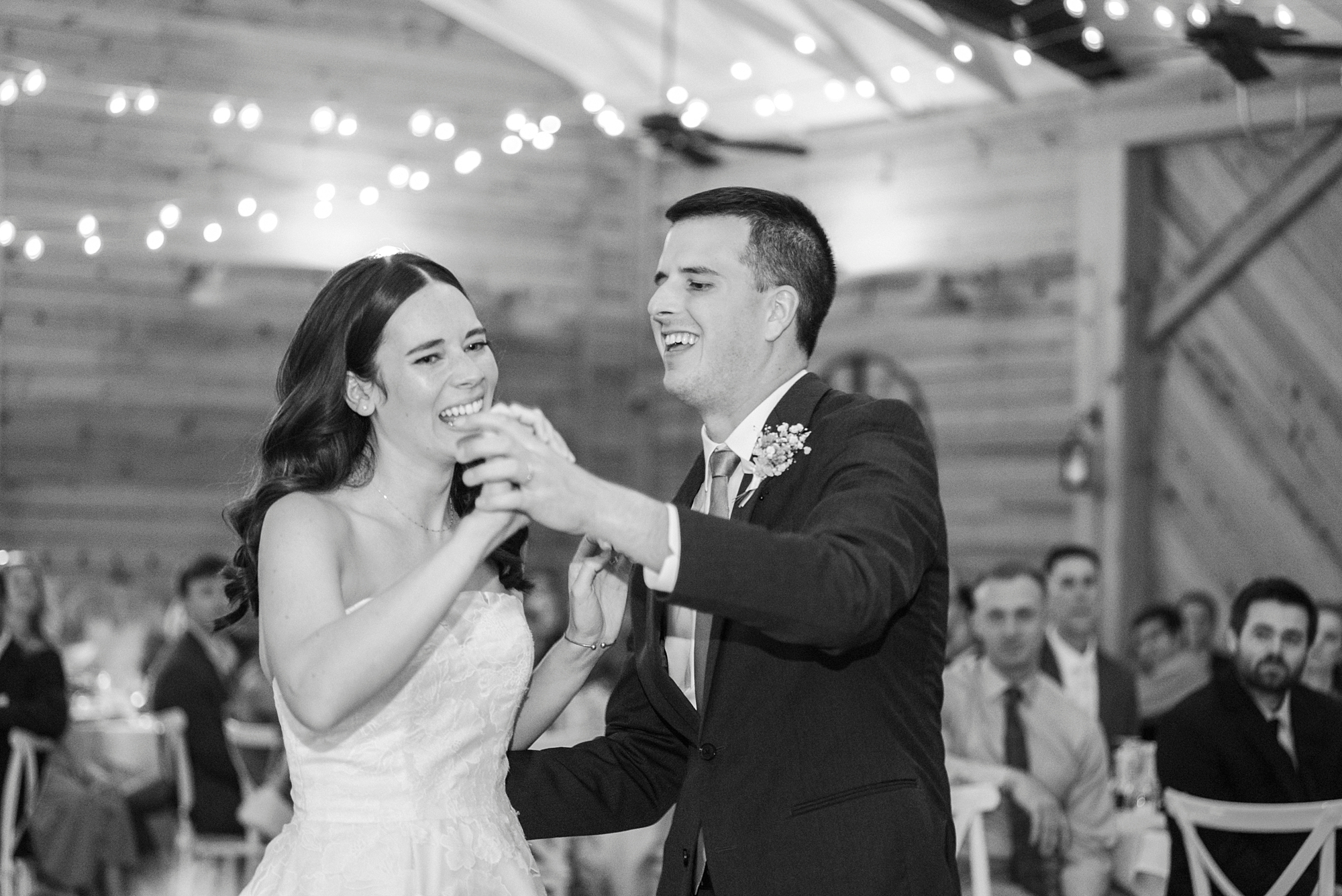 bride and groom dance together during reception in Charlotte NC