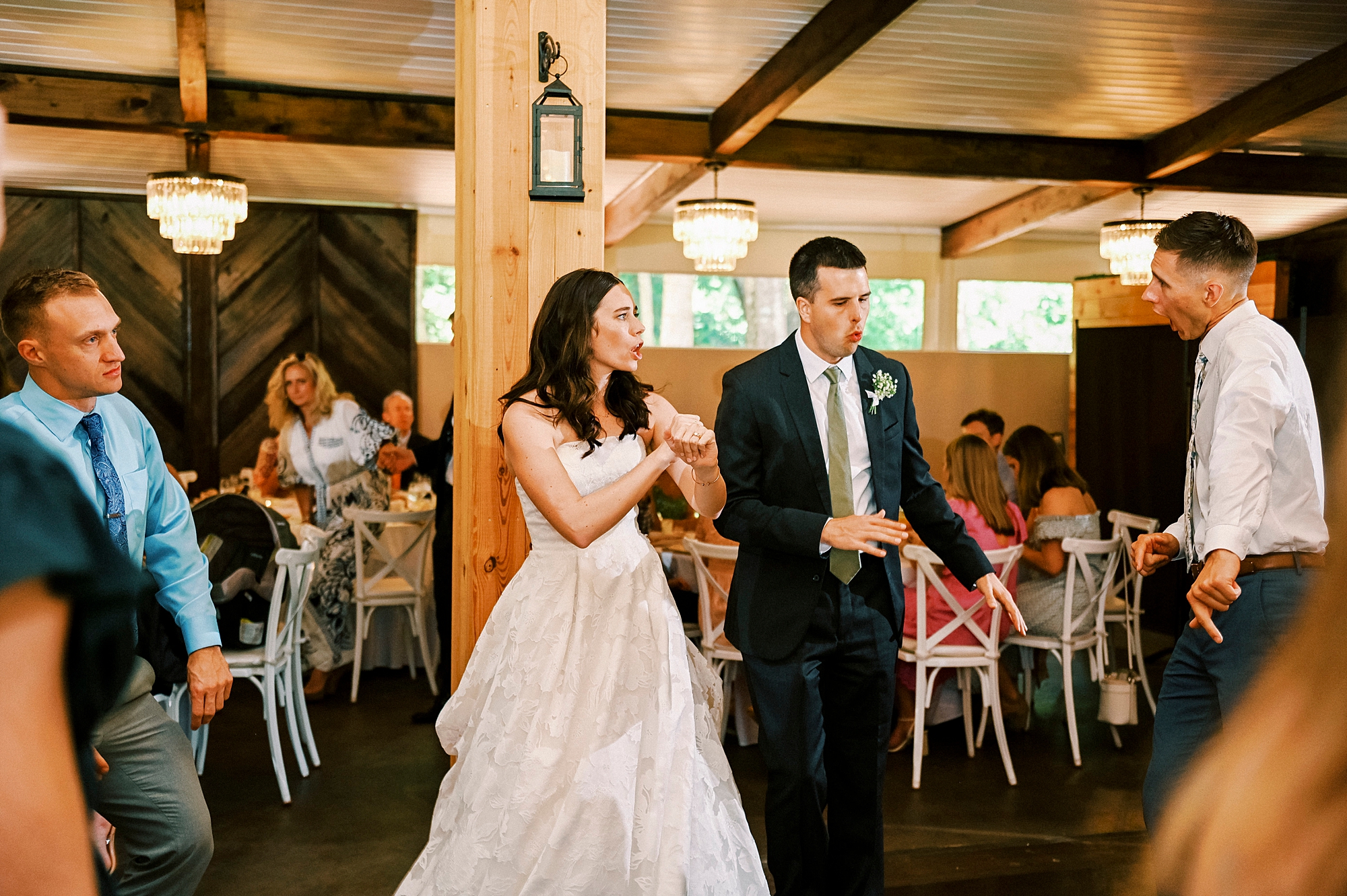 newlyweds dance together during Charlotte NC wedding reception