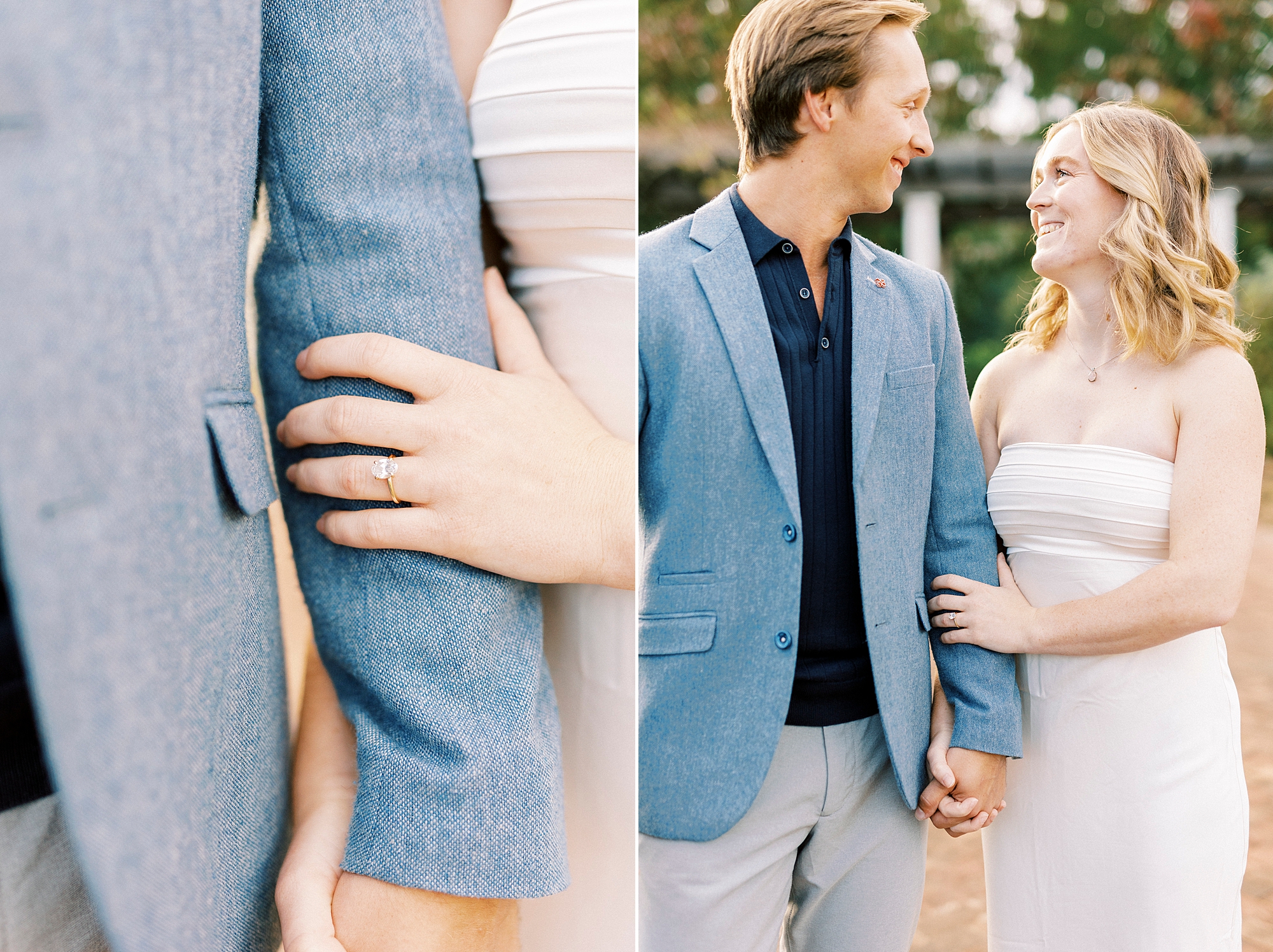 woman in white dress holds sleeve of man's blue suit jacket during engagement photos 