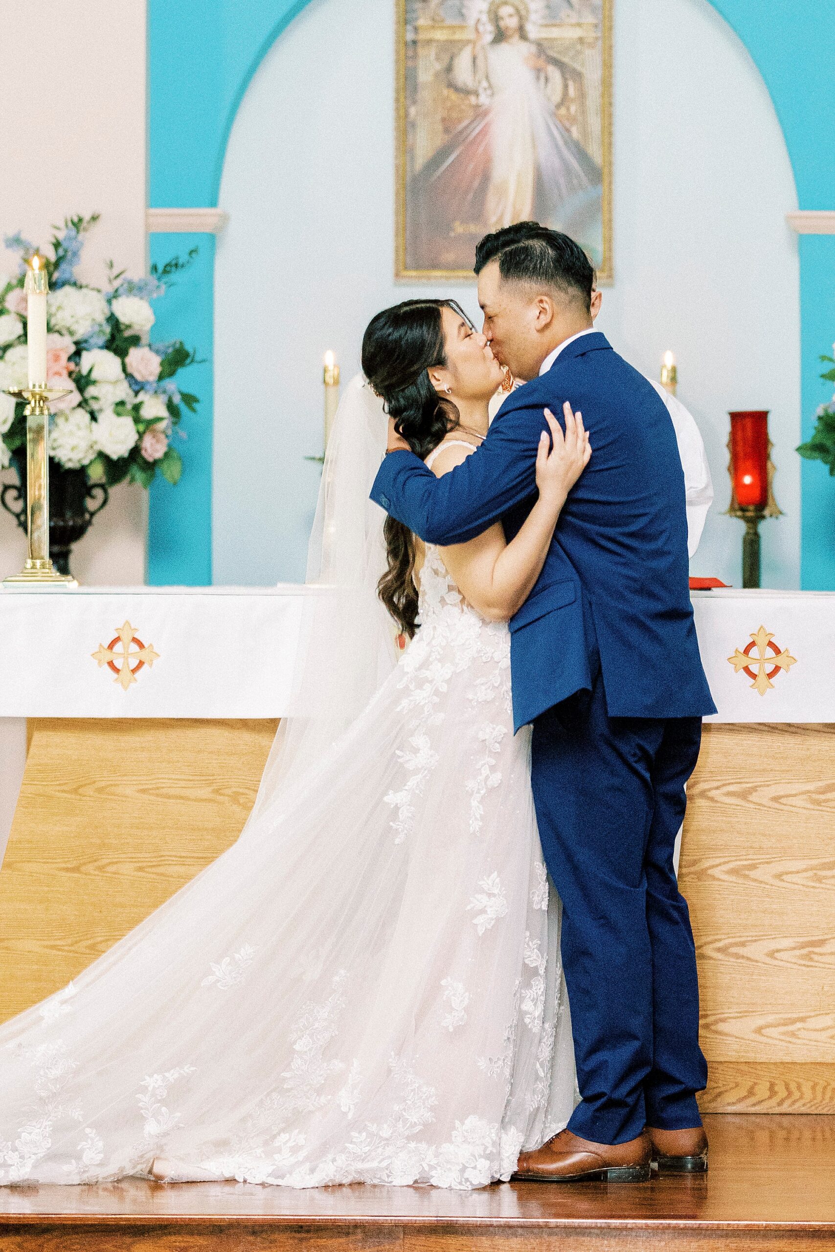 newlyweds kiss inside Belmont NC church 