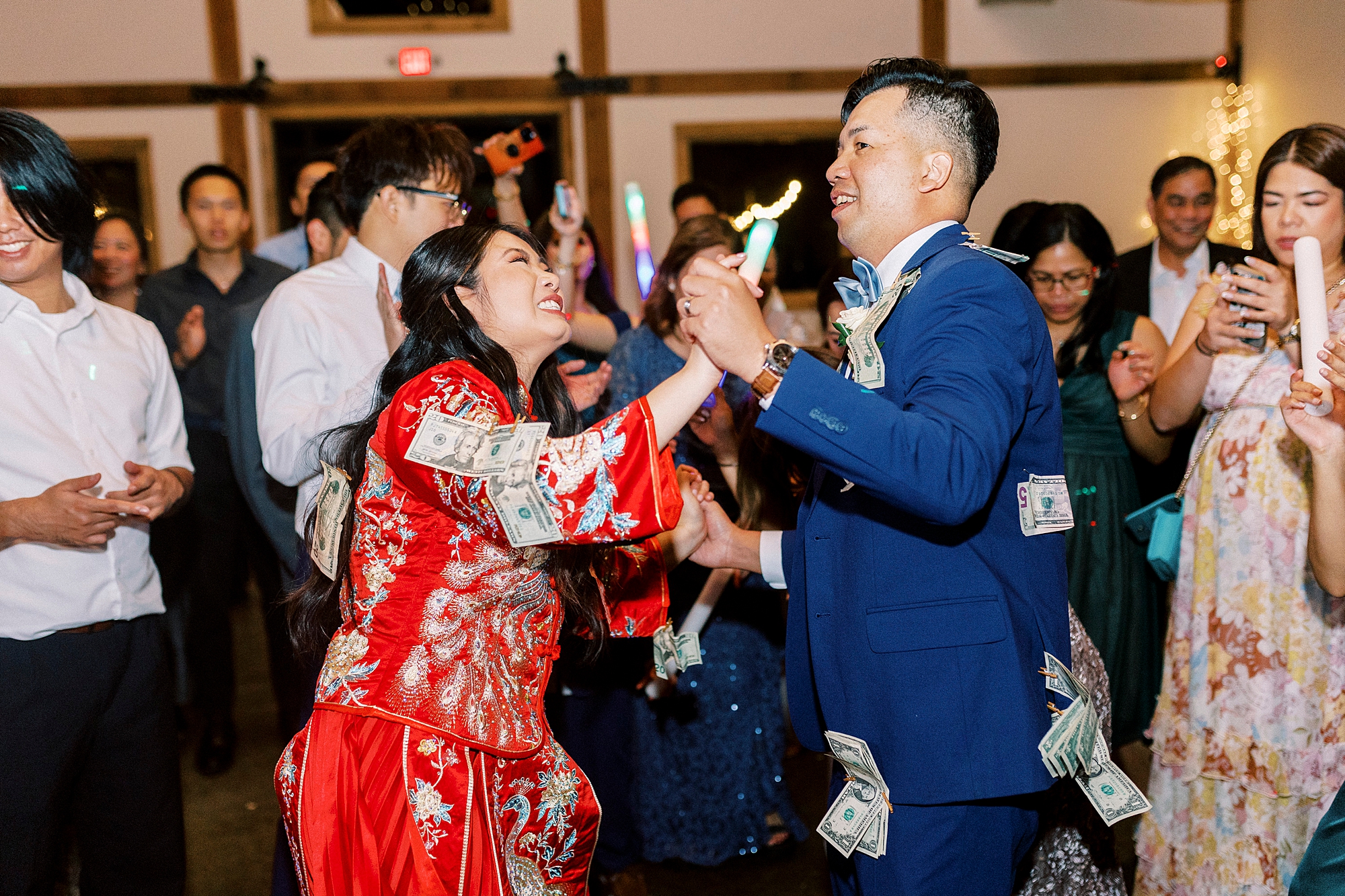 bride and groom dance together at reception at Camelot Meadows
