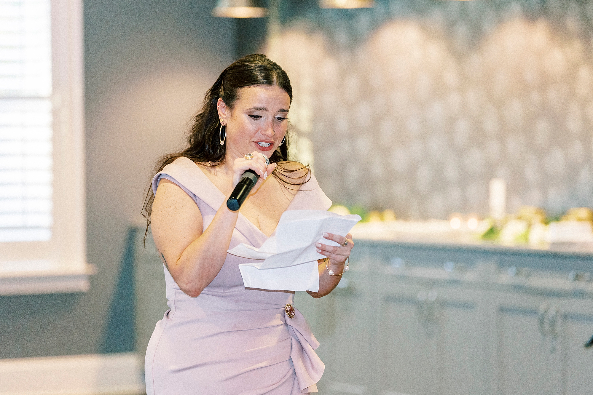 bridesmaid gives speech during wedding reception at Palisades Country Club