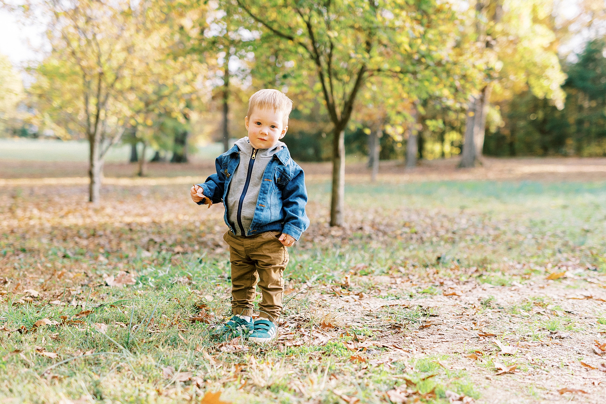toddler runs through the grass at Rob Wallace Park