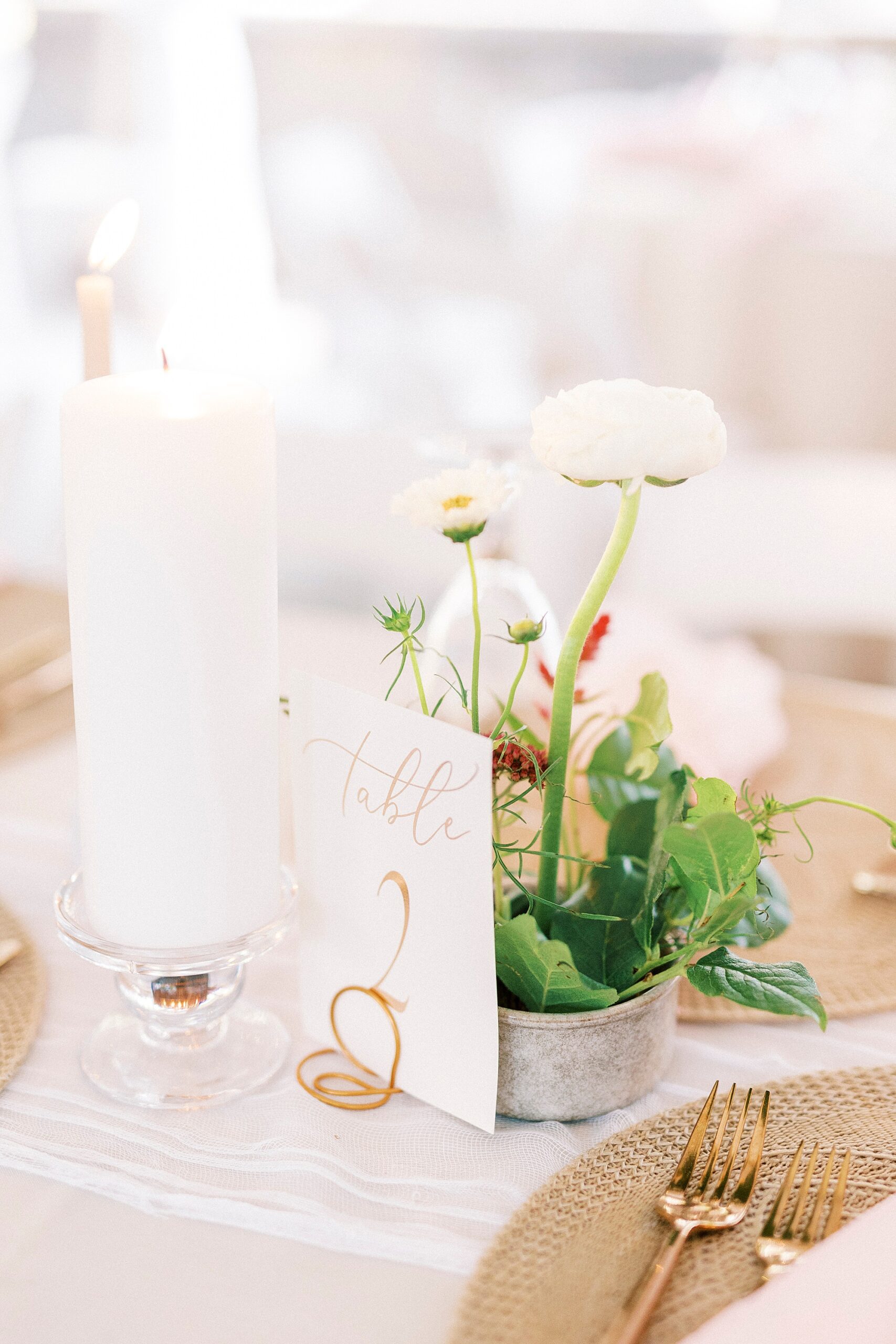 wedding reception centerpiece with white florals