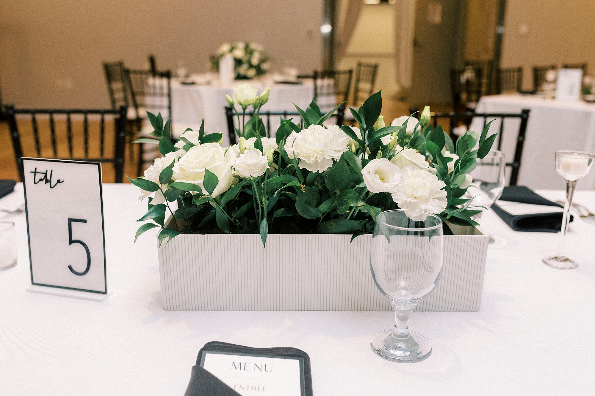 white floral centerpiece for Charlotte wedding reception