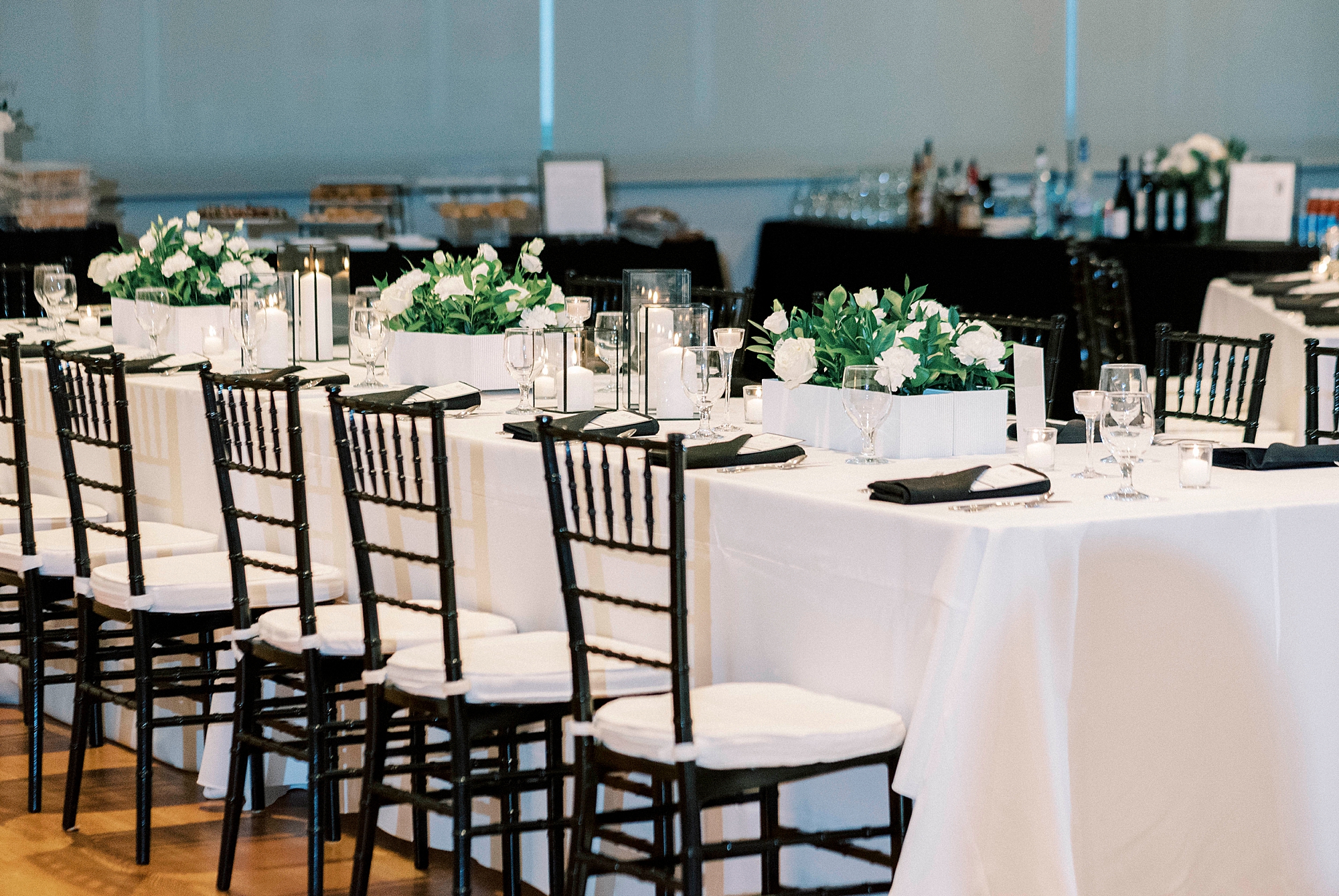 wedding reception with white and black details at the Mint Museum Uptown