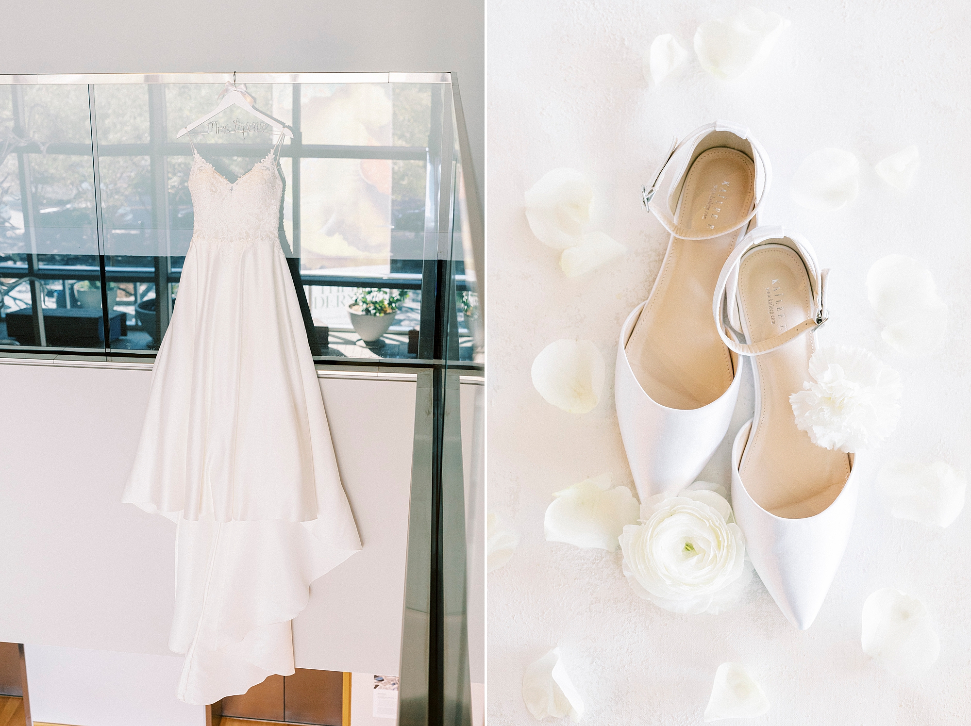wedding dress hangs in window next to bride's white shoes