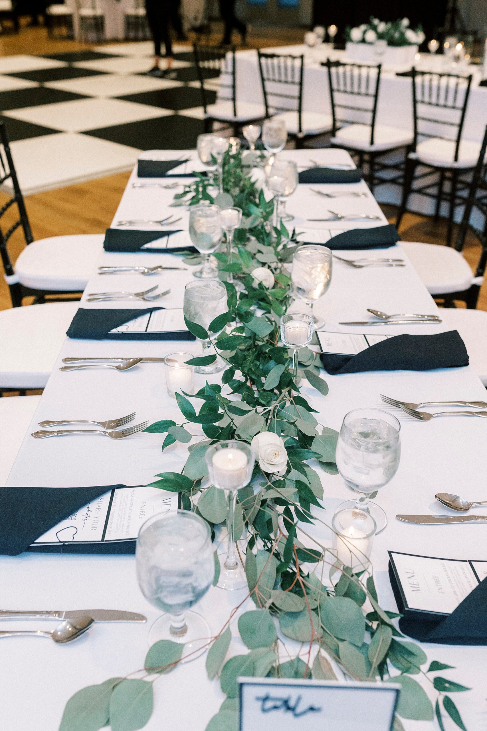 wedding reaction with greenery down the middle of the table at the Mint Museum Uptown