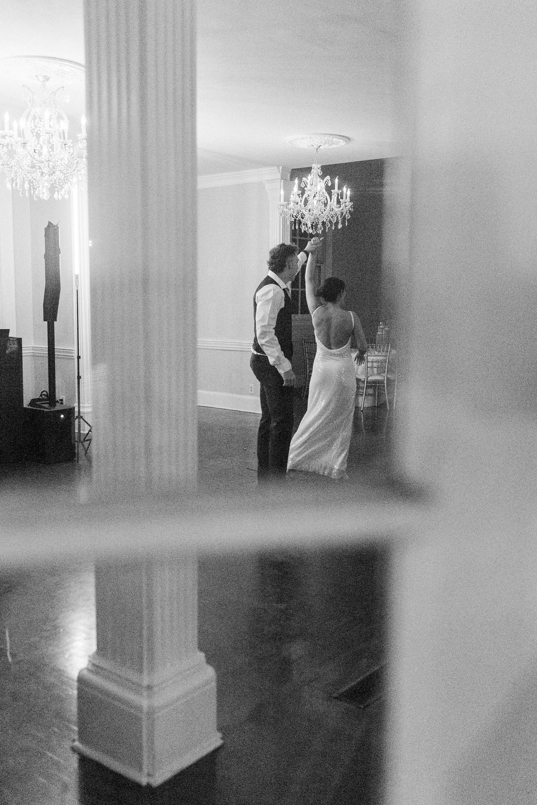 photo of bride and groom taken through window pane at Separk Mansion