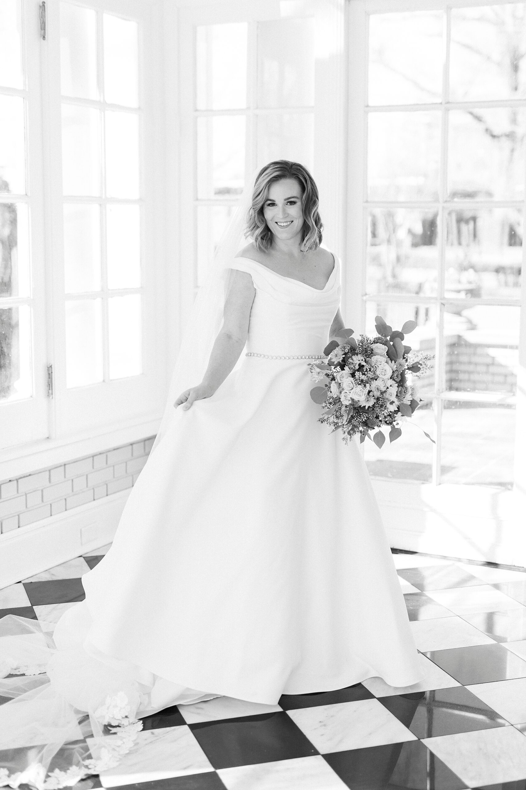 black and white portrait in sunroom at Separk Mansion