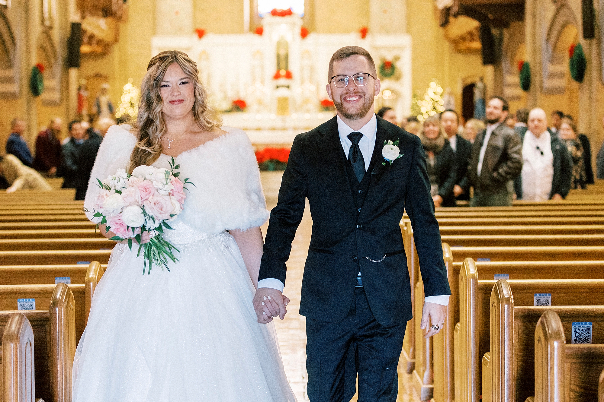 bride and groom walk up aisle in Greensboro NC church