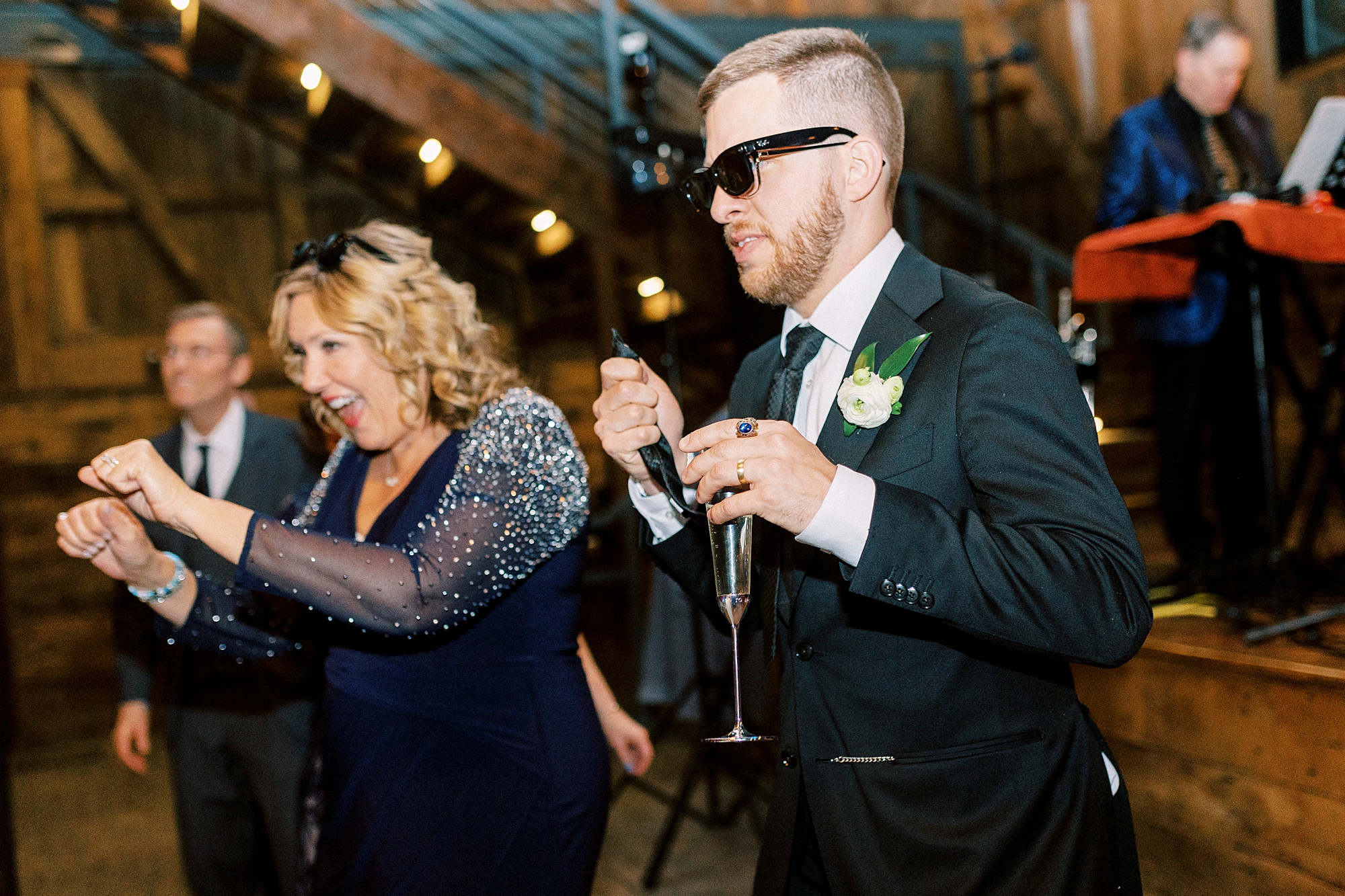 groom dances with mother during wedding reception in North Carolina 