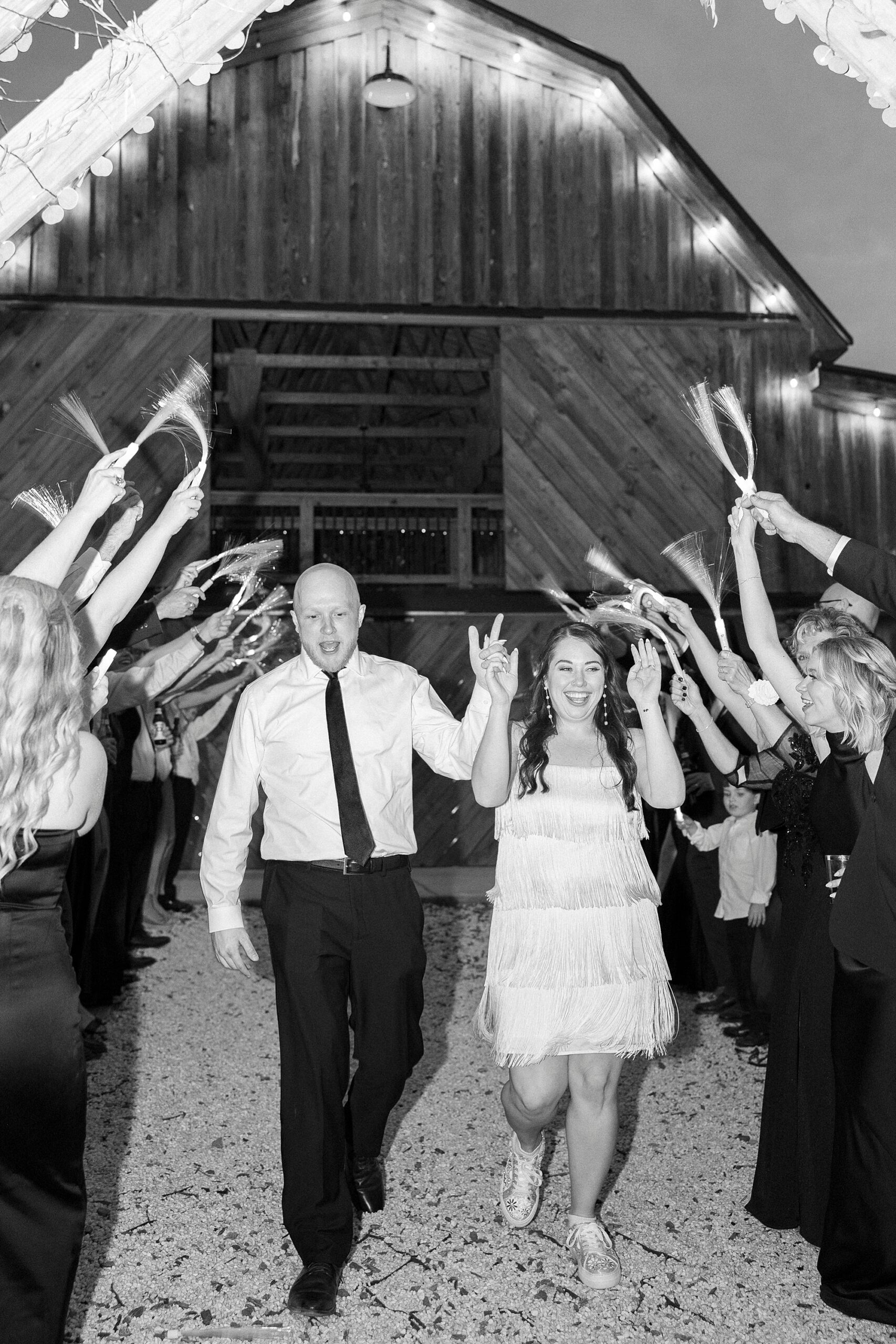 newlyweds cheer leaving during wedding reception in Mount Pleasant NC
