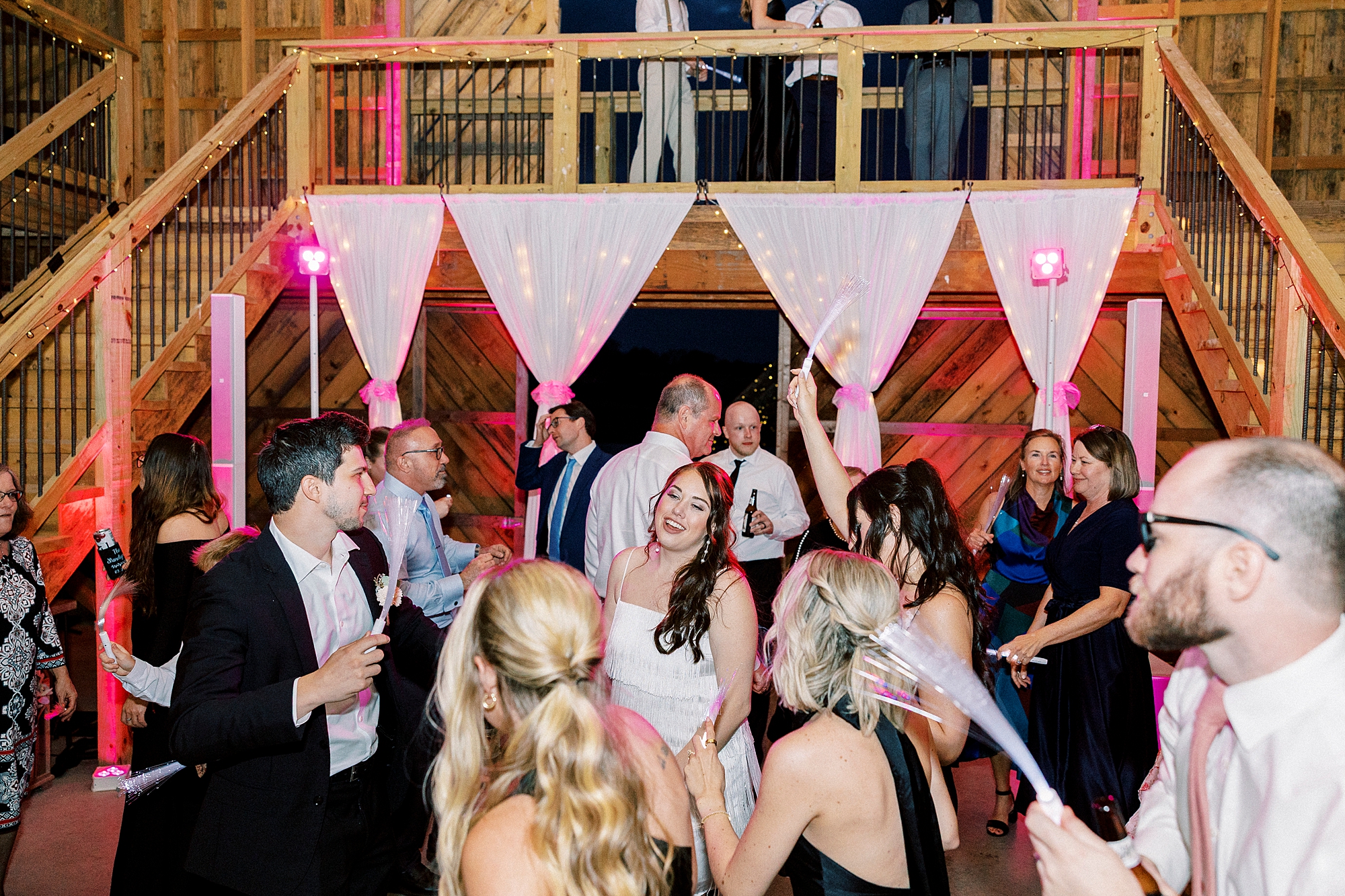 wedding guests dance with the bride during during wedding reception in Mount Pleasant NC