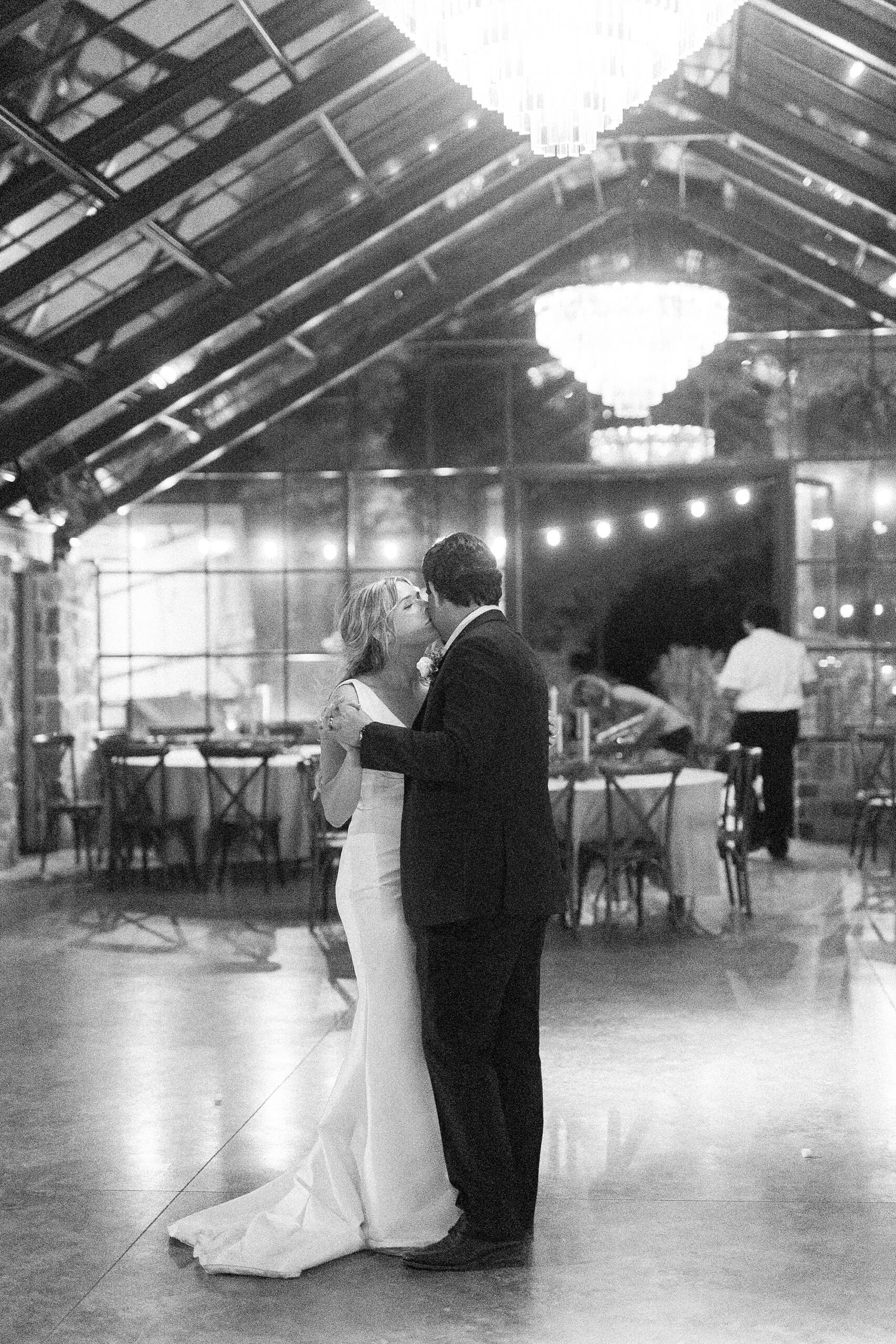 bride and groom dance during private last dance at reception