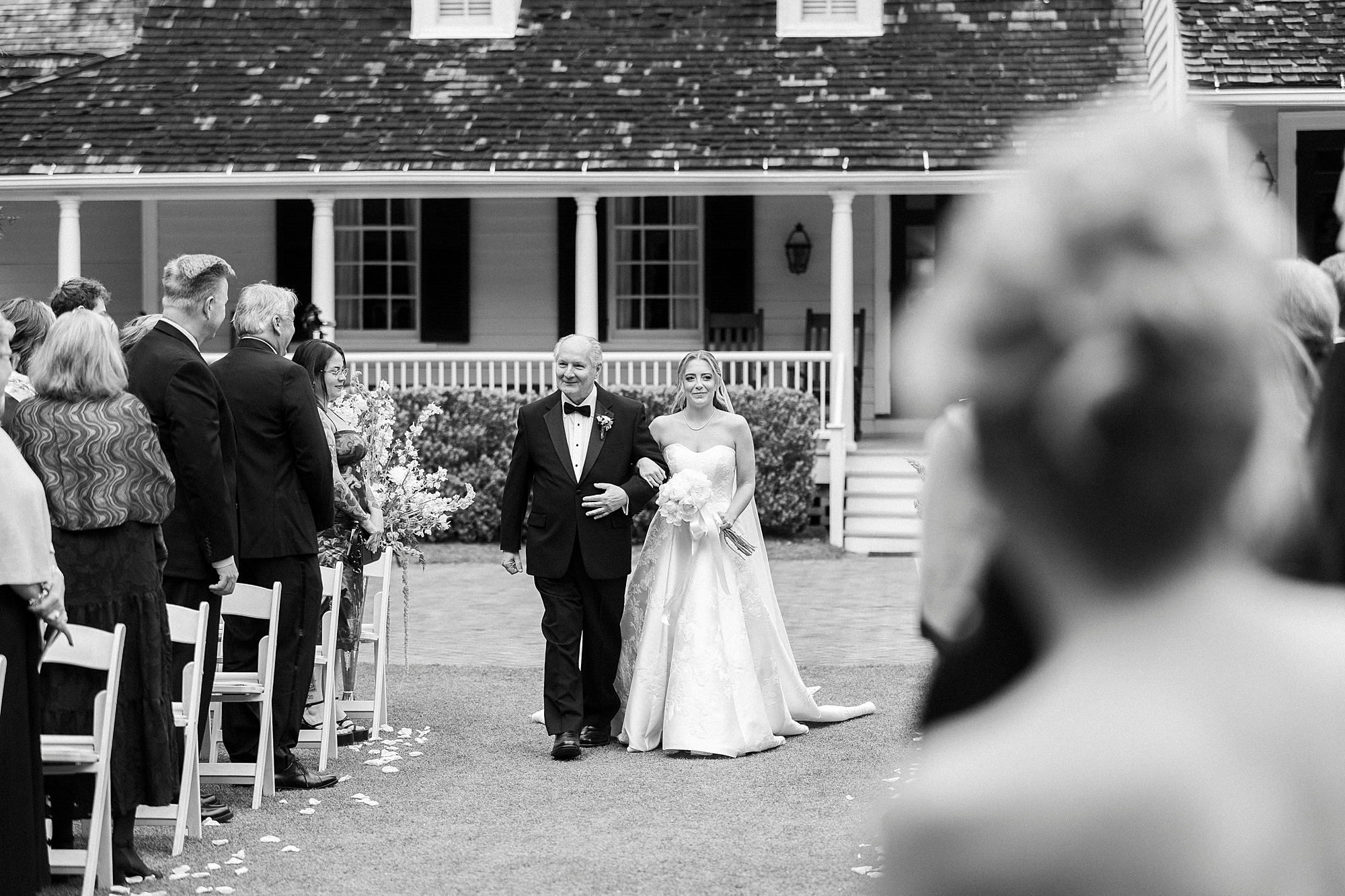 father escorts bride down aisle at the Sutherland