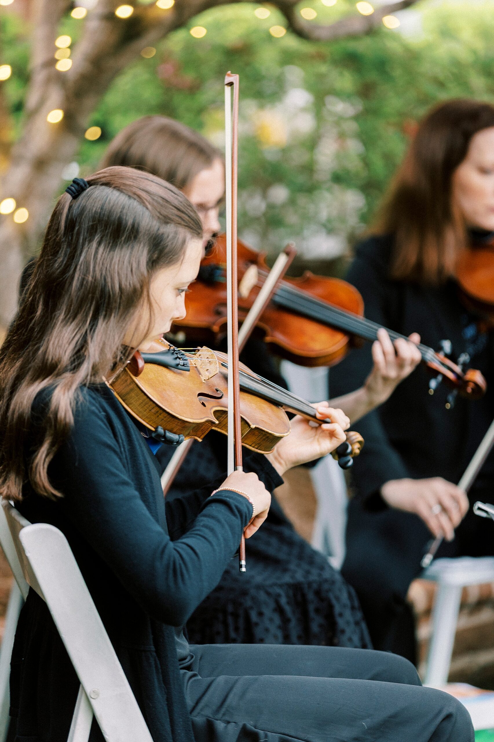 violinists perform during wedding ceremony in North Carolina
