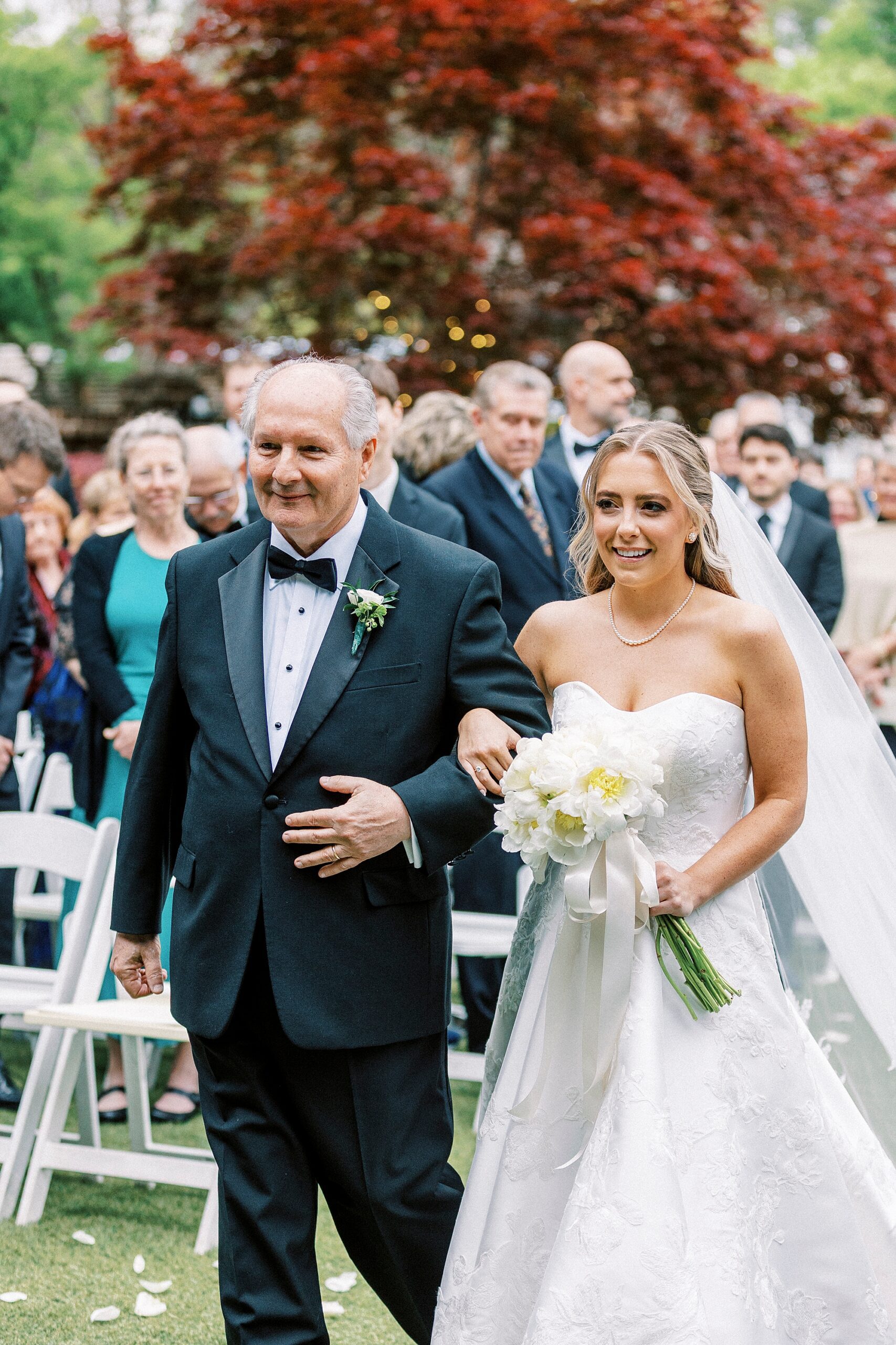 father escorts bride up aisle at the Sutherland