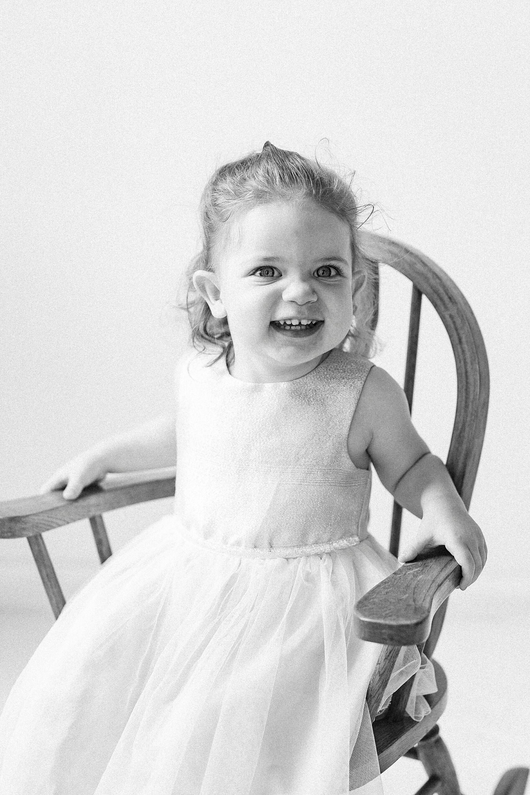 girl laughs during Birthday Photos at Charlotte NC Photography Studio