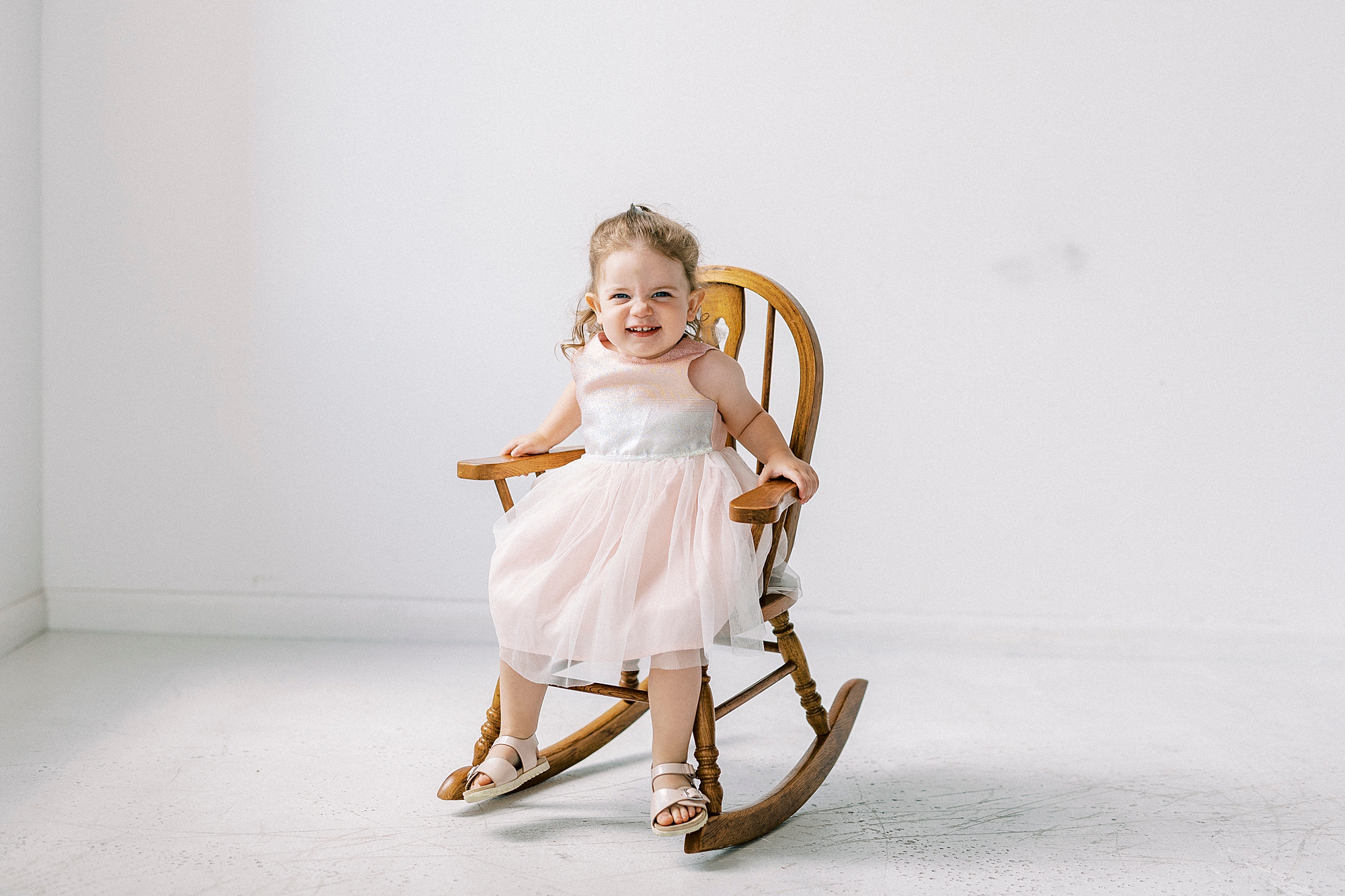 two year old rocks during Birthday Photos at Charlotte NC Photography Studio
