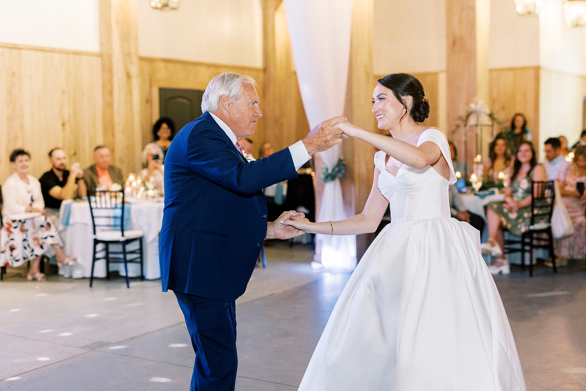 bride dances with father during NC wedding reception 