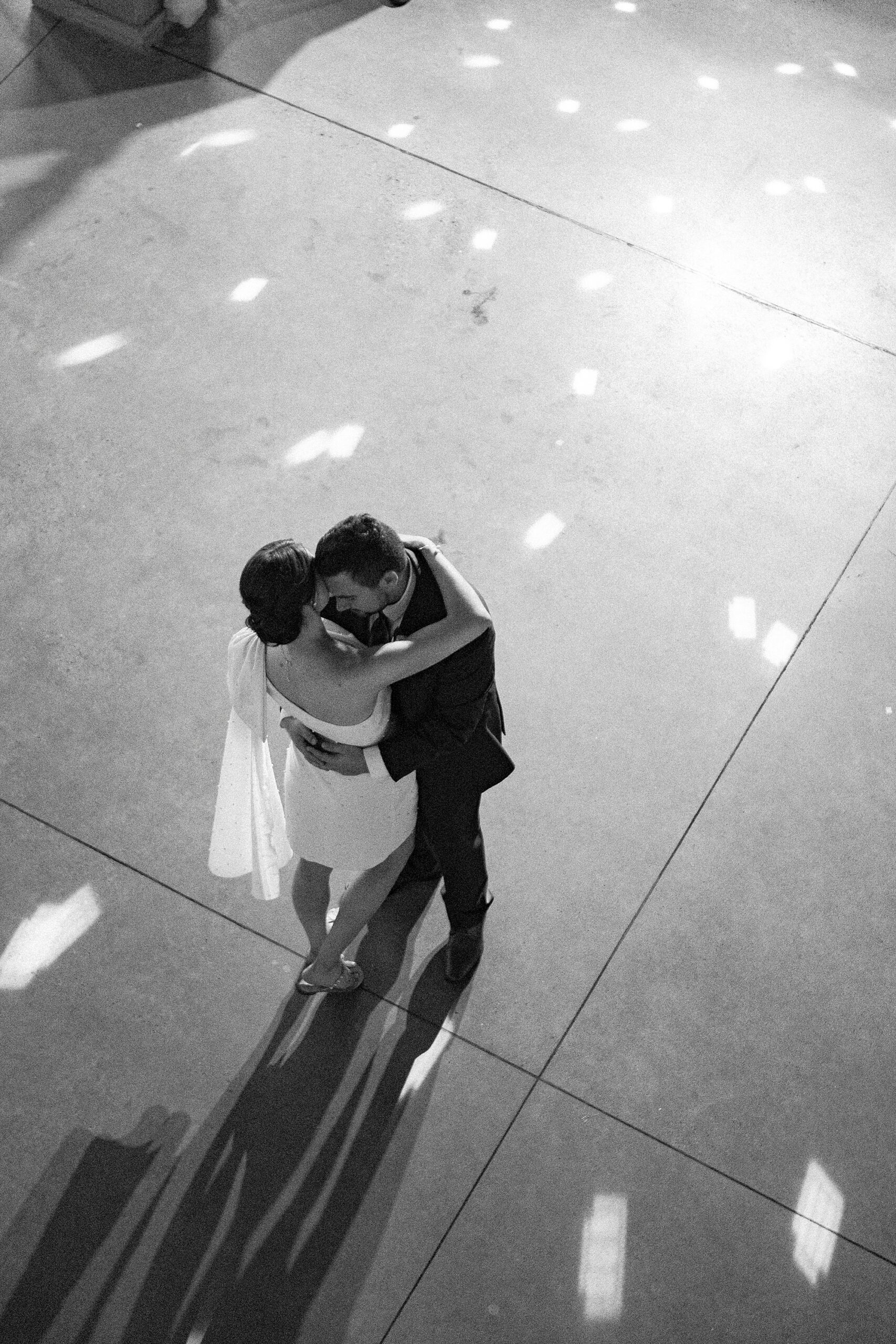 photo of bride and groom dancing from overhead 