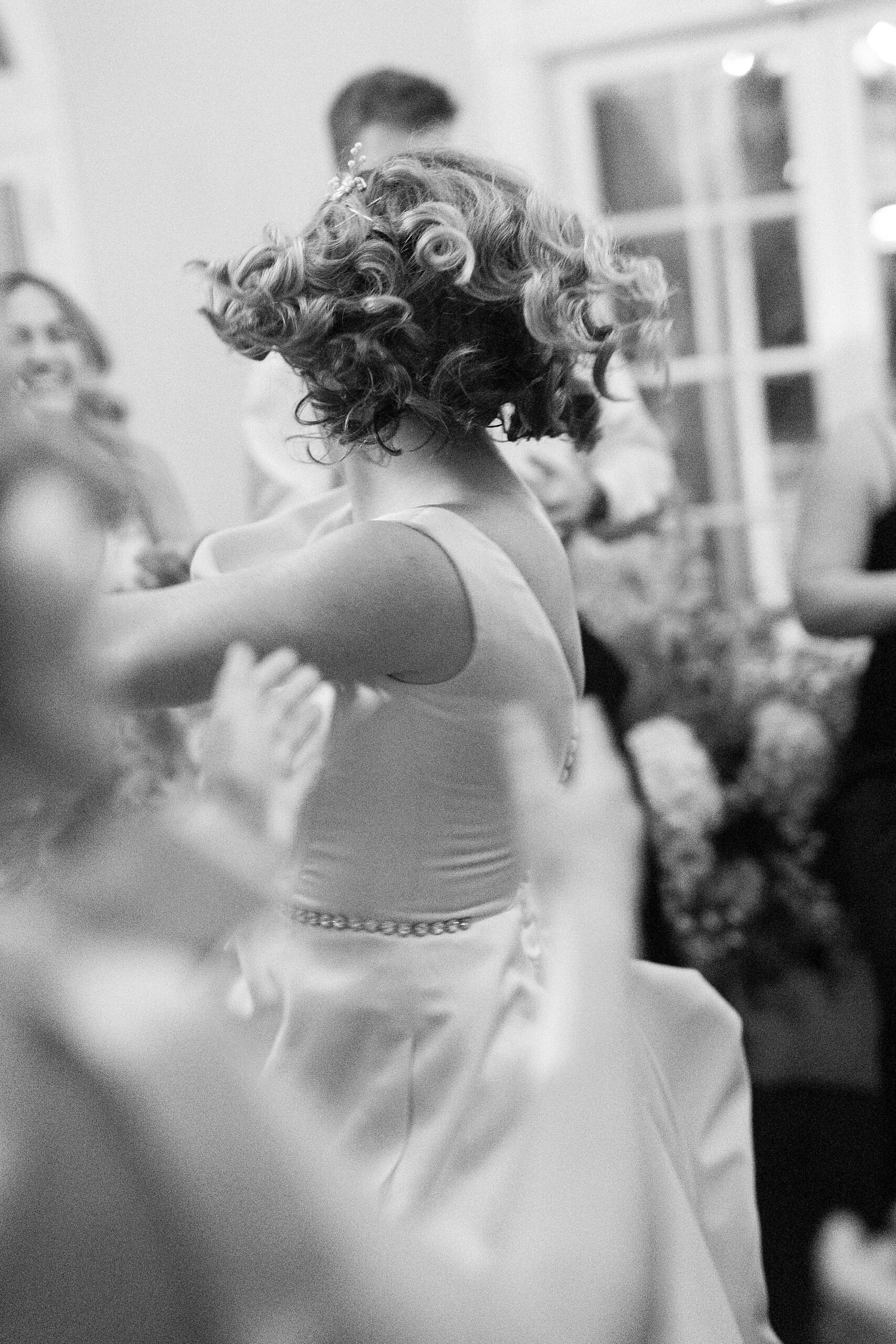 bride twirls on dance floor during reception