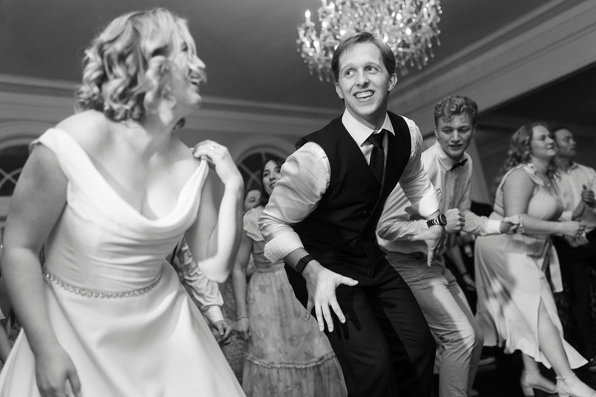 bride and groom dance together during reception at Separk Mansion