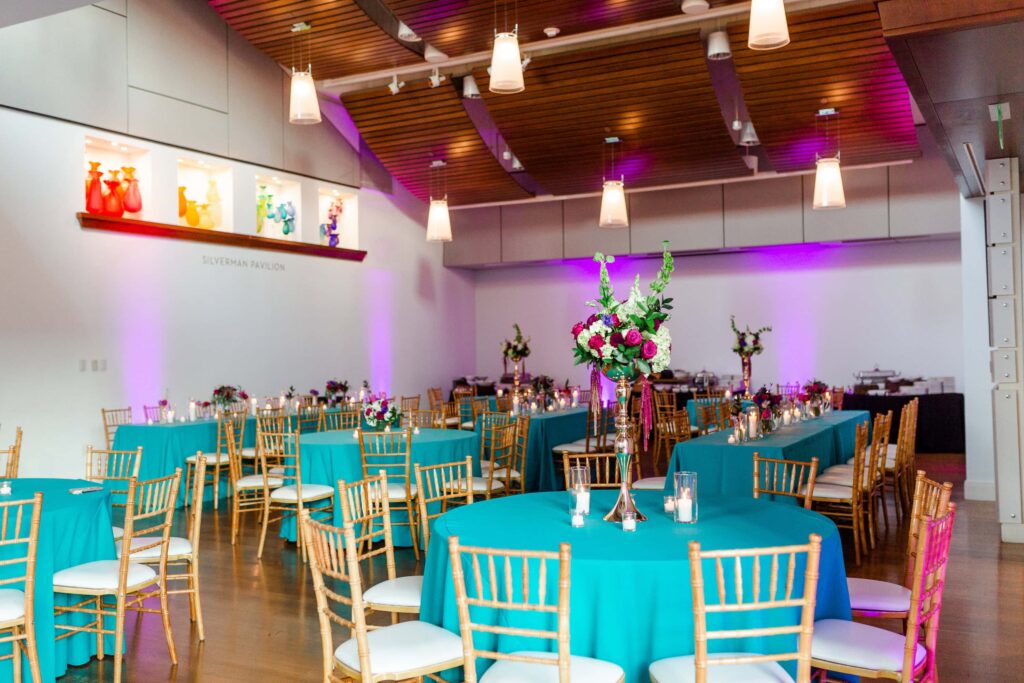 indoor wedding reception with teal and purple theme at foundation for the Carolinas in uptown charlotte