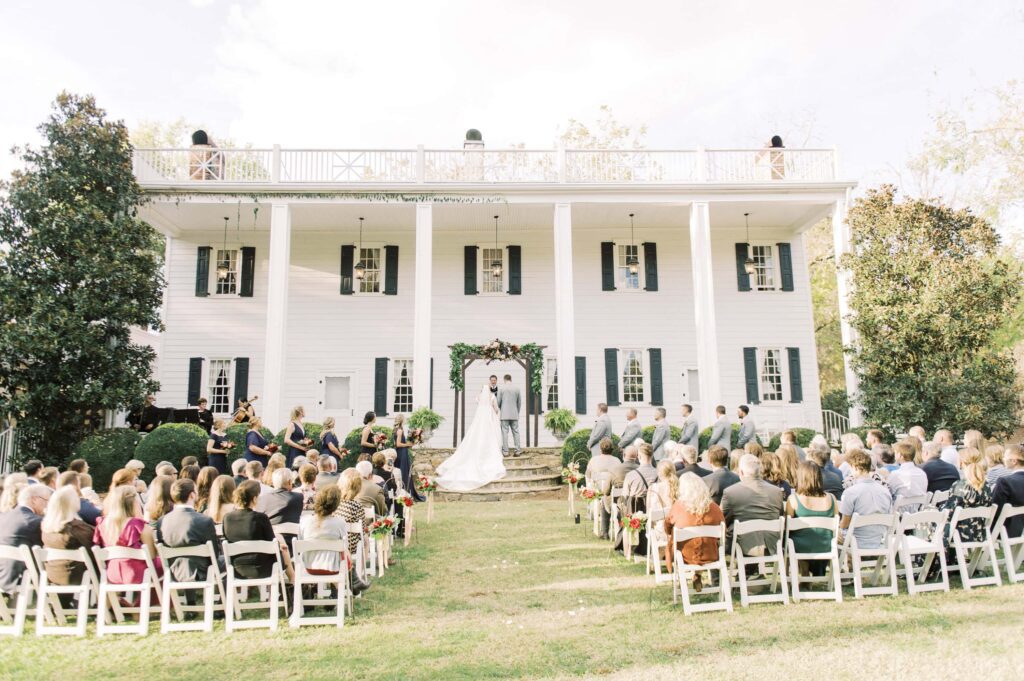 wedding ceremony in front of historic White House at Vesuvius vineyards wedding venue 
