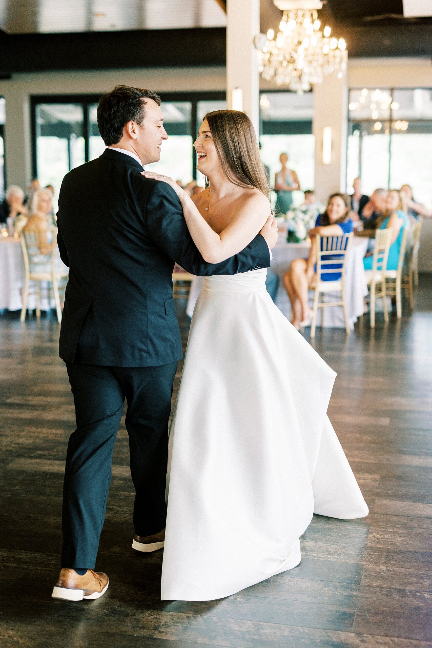 bride and groom dance together during reception at Terrace at Cedar Hill