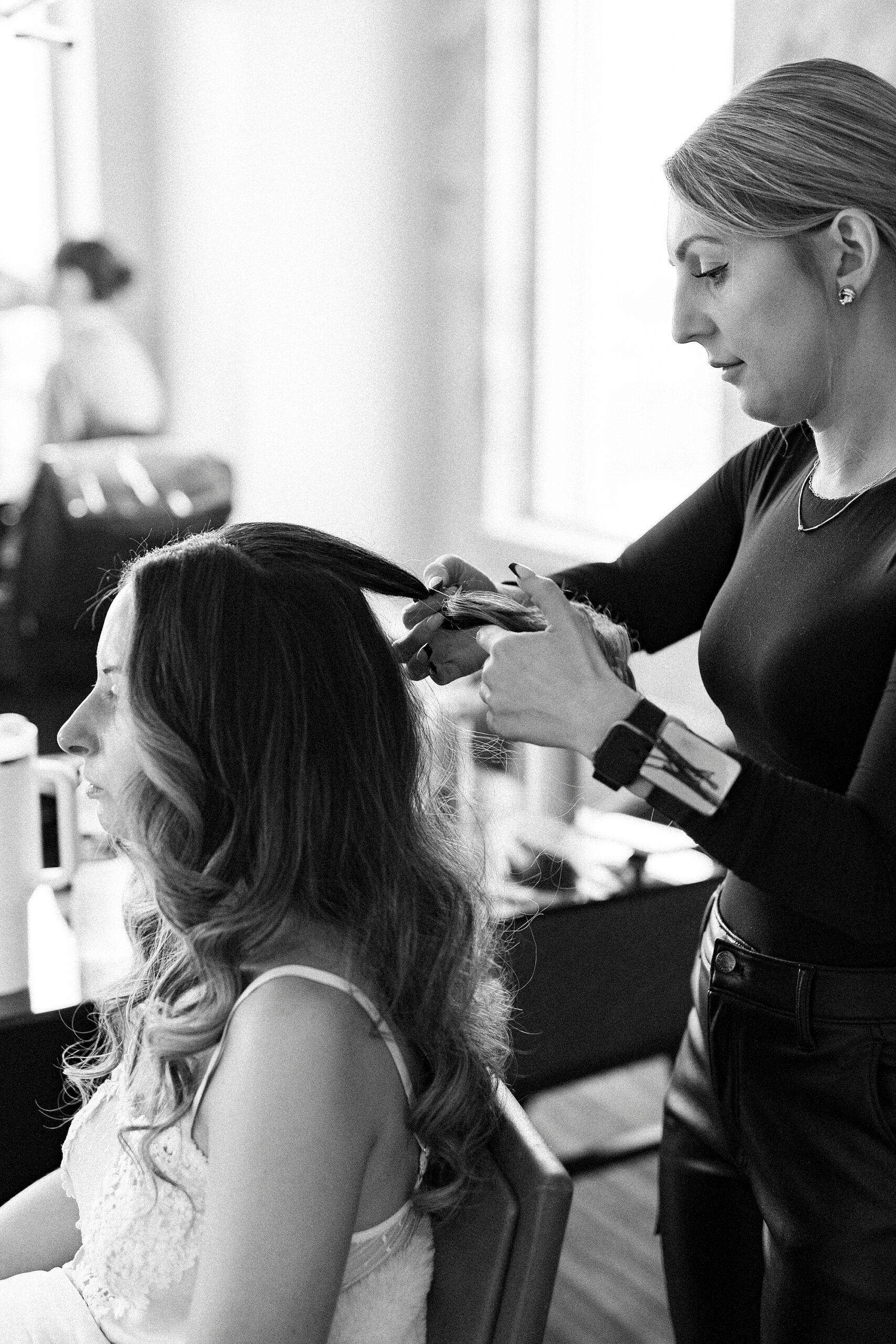 bride getting hair done