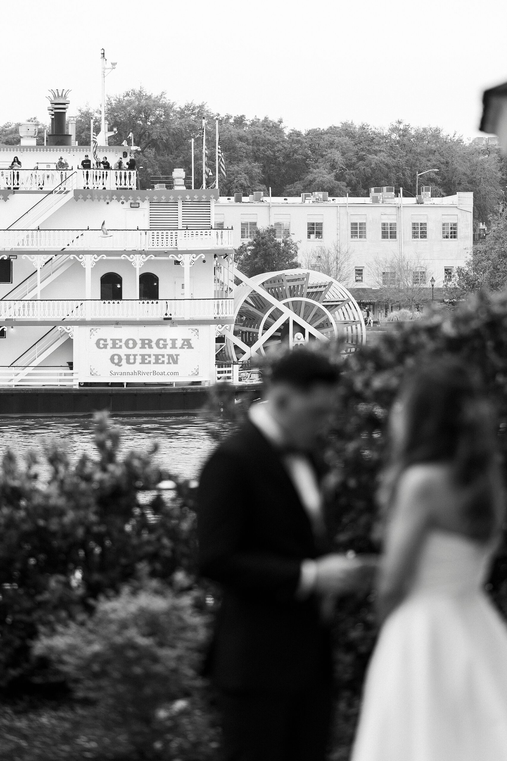 bride and groom by the Savannah riverfront 