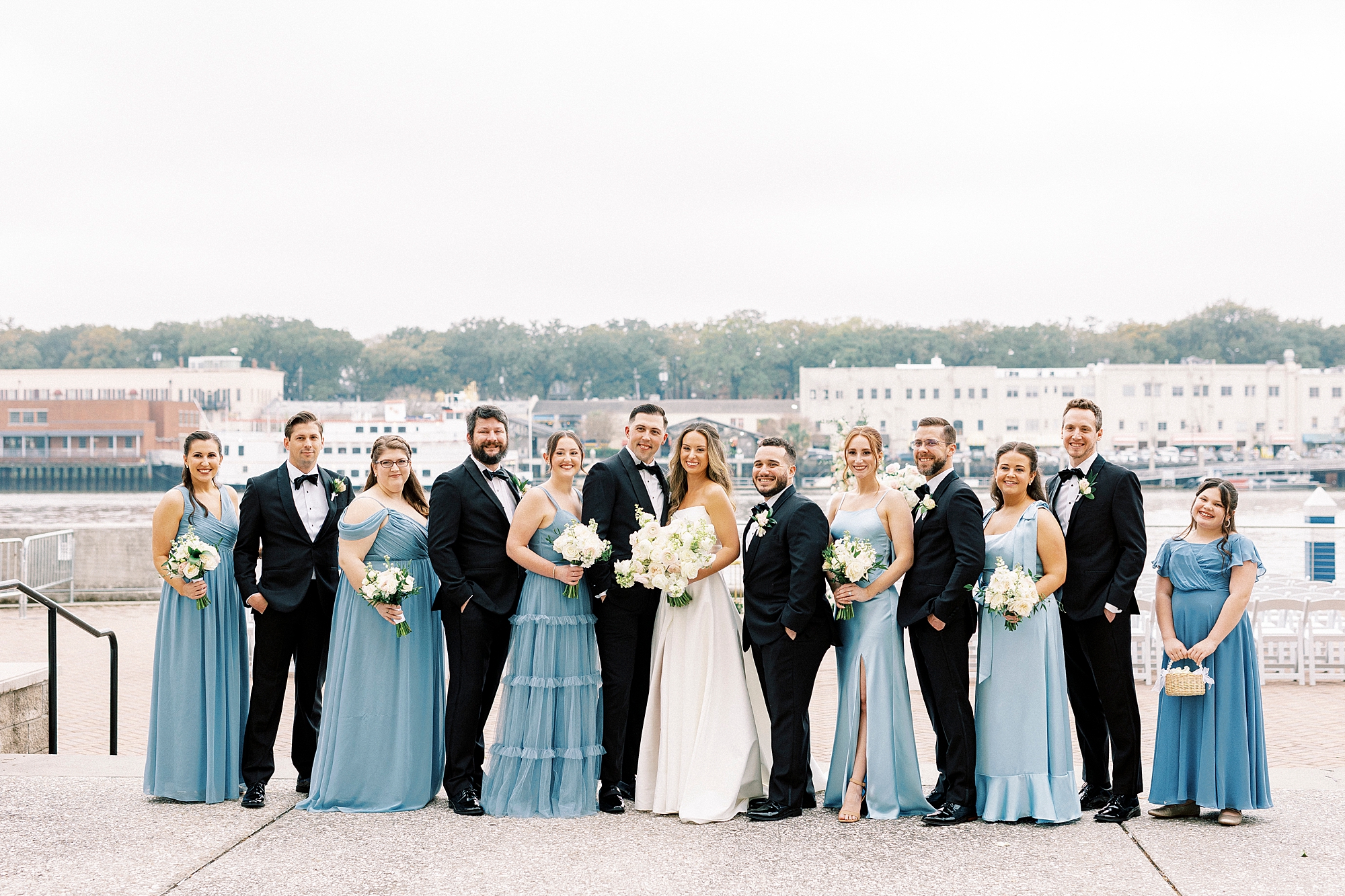 wedding party portraits by the water