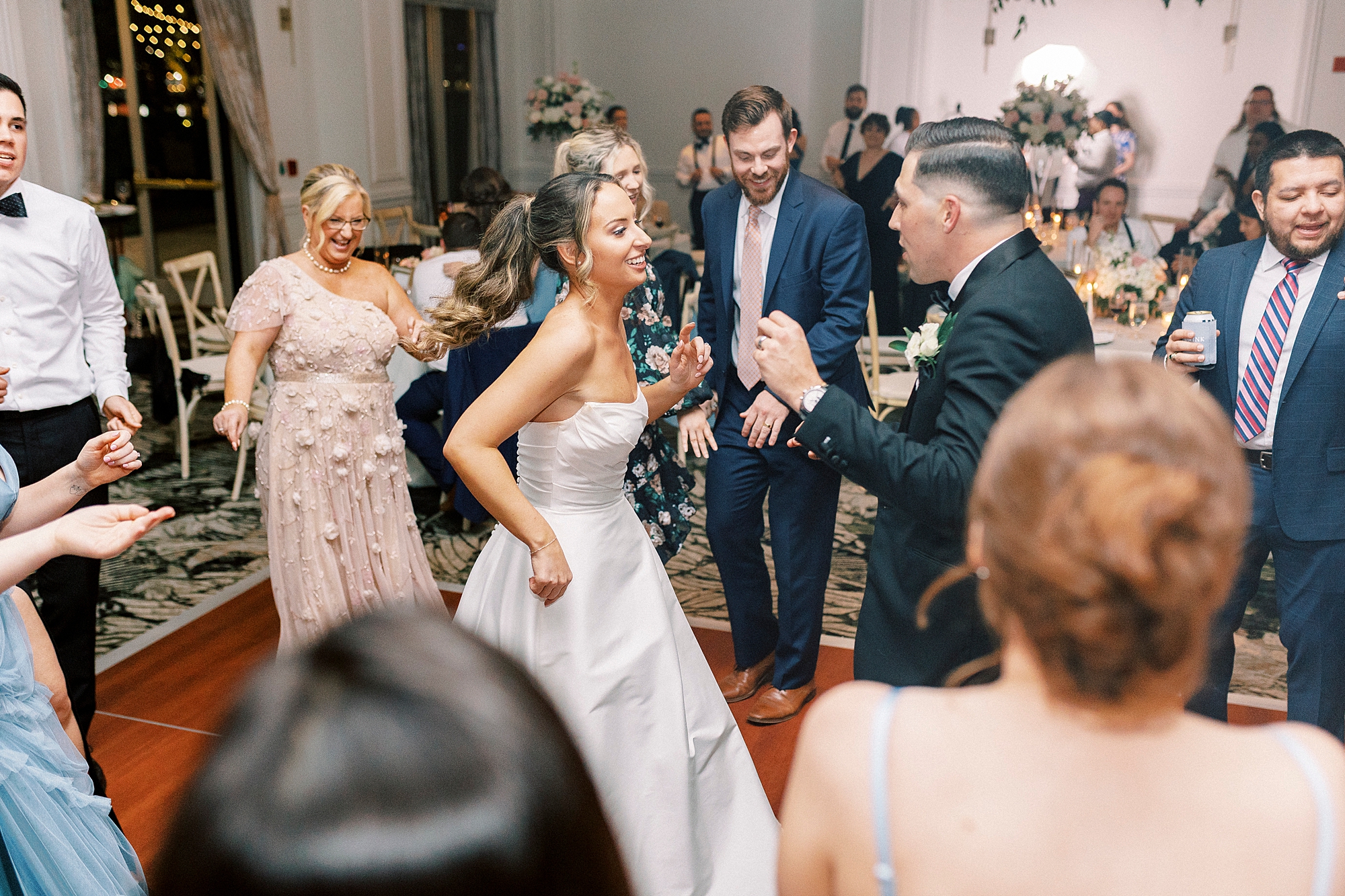 candid wedding portraits of the dance floor