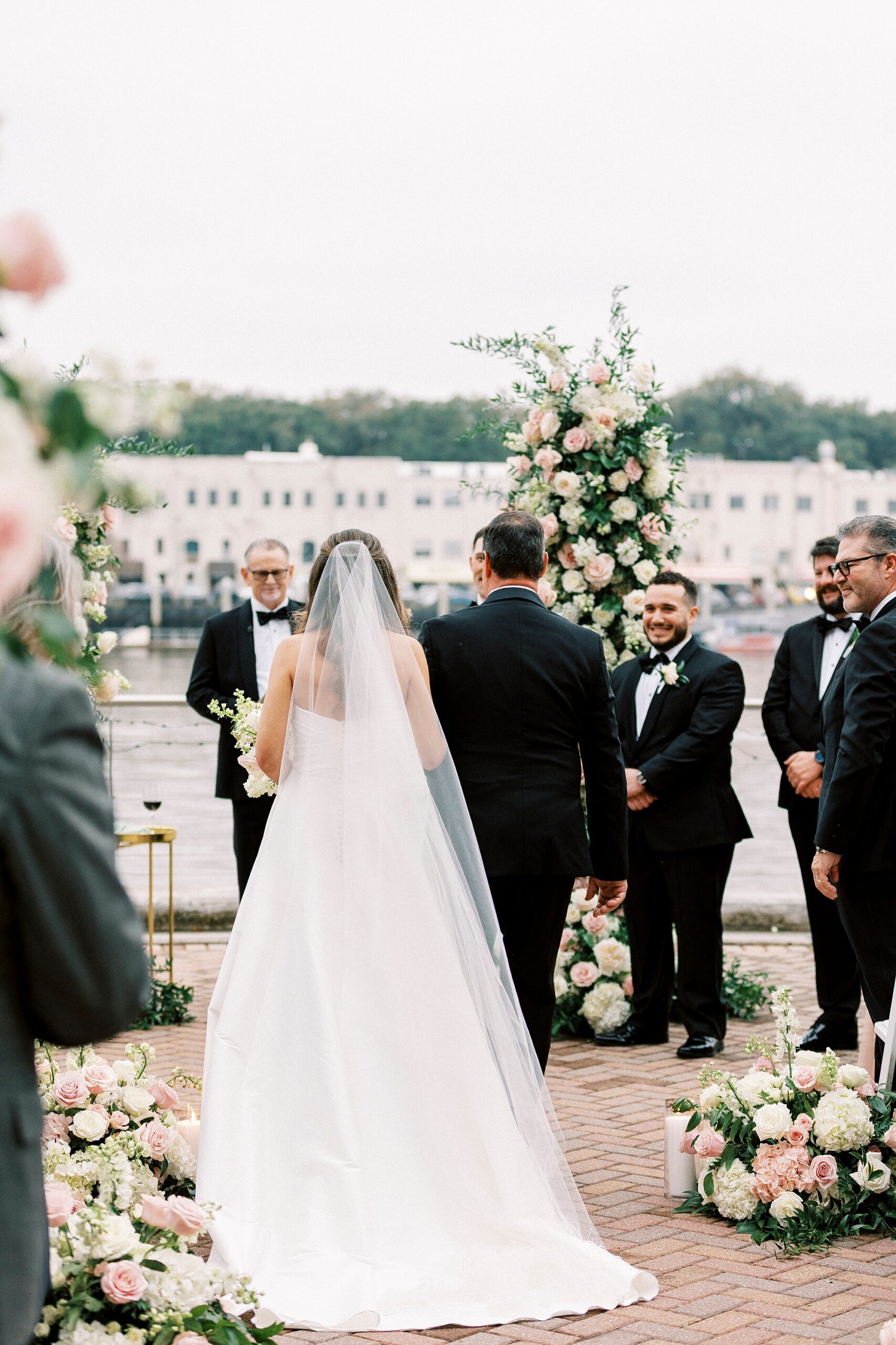 bride walking down the aisle at Waterfront Wedding at The Westin Savannah