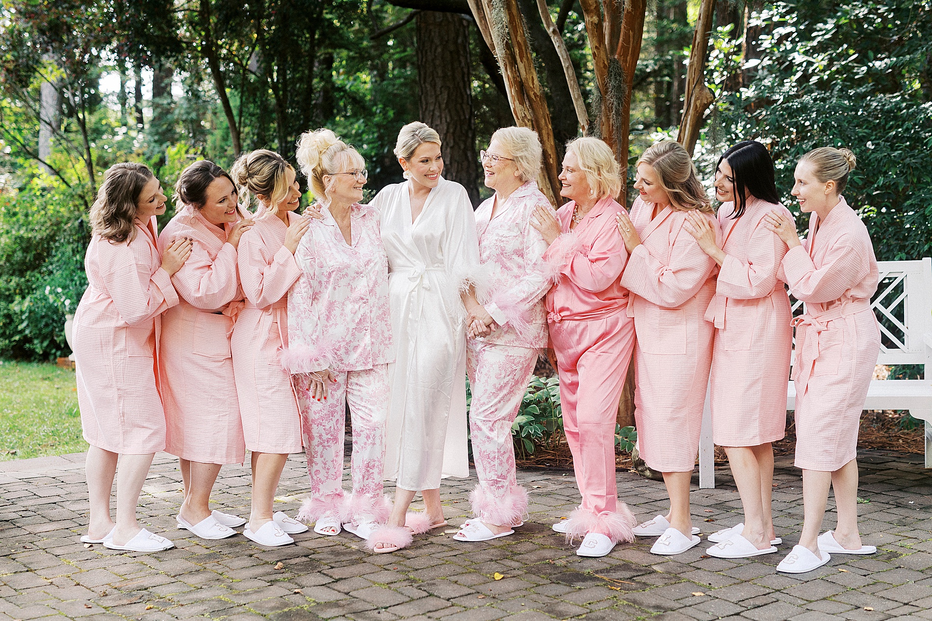 bride and bridal party in matching robes