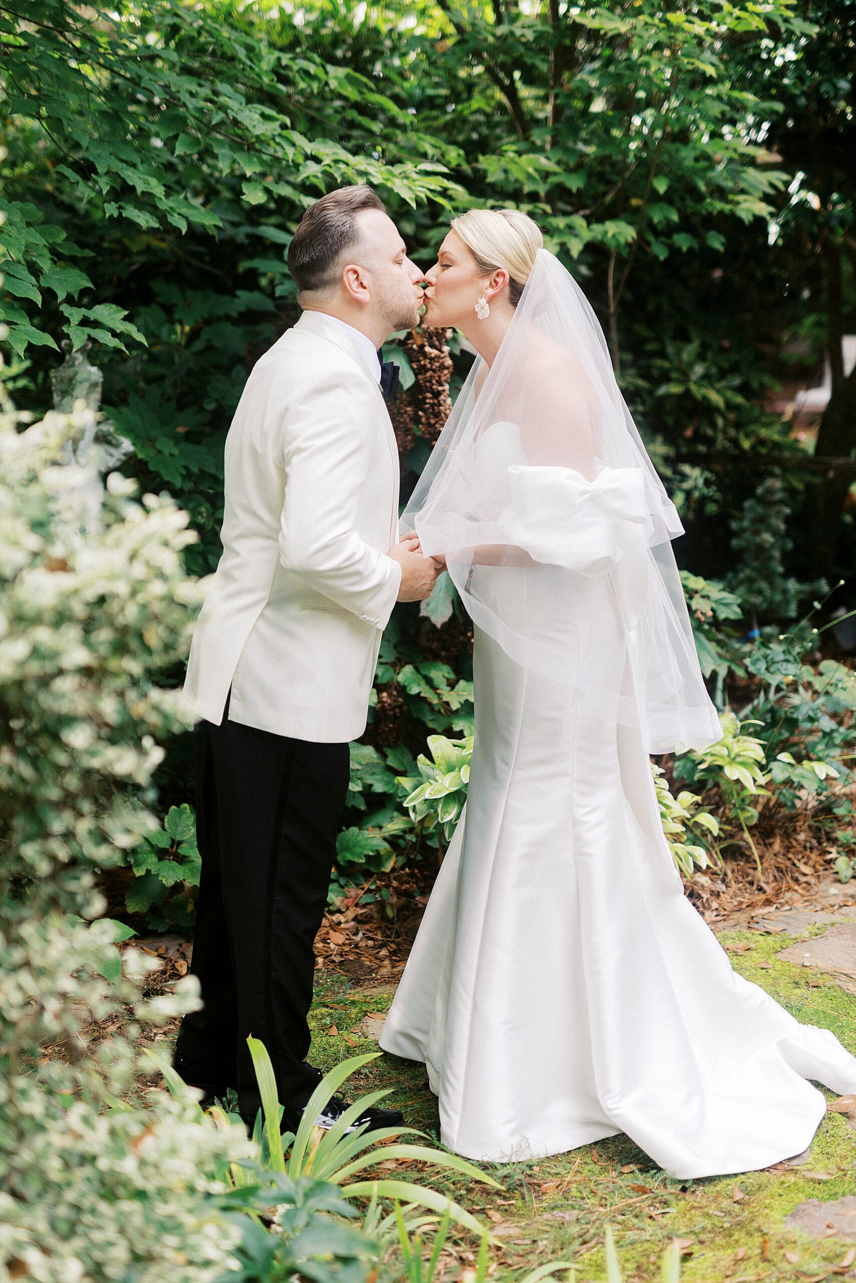 bride and groom kiss