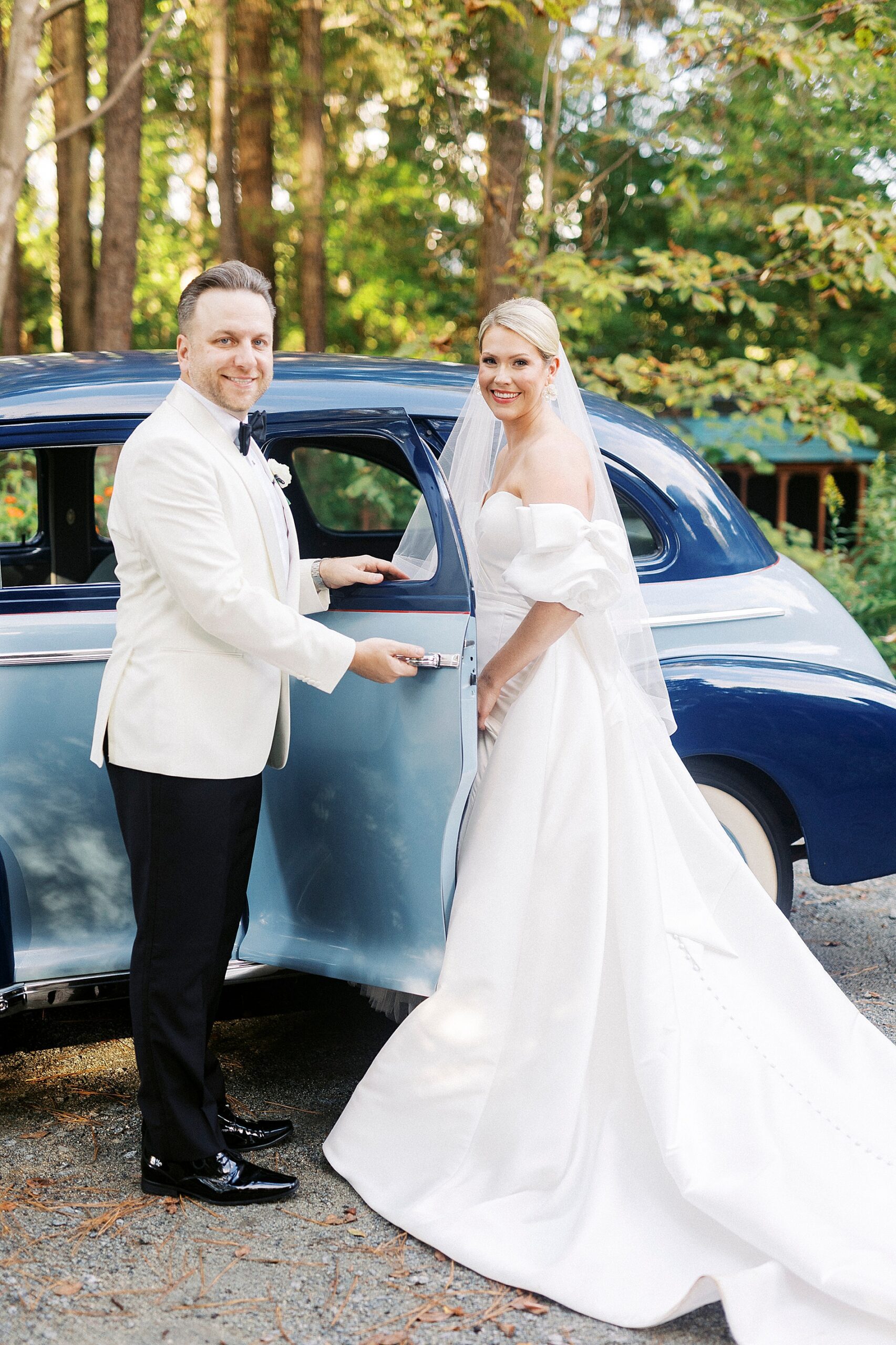 groom opens cardoor for bride