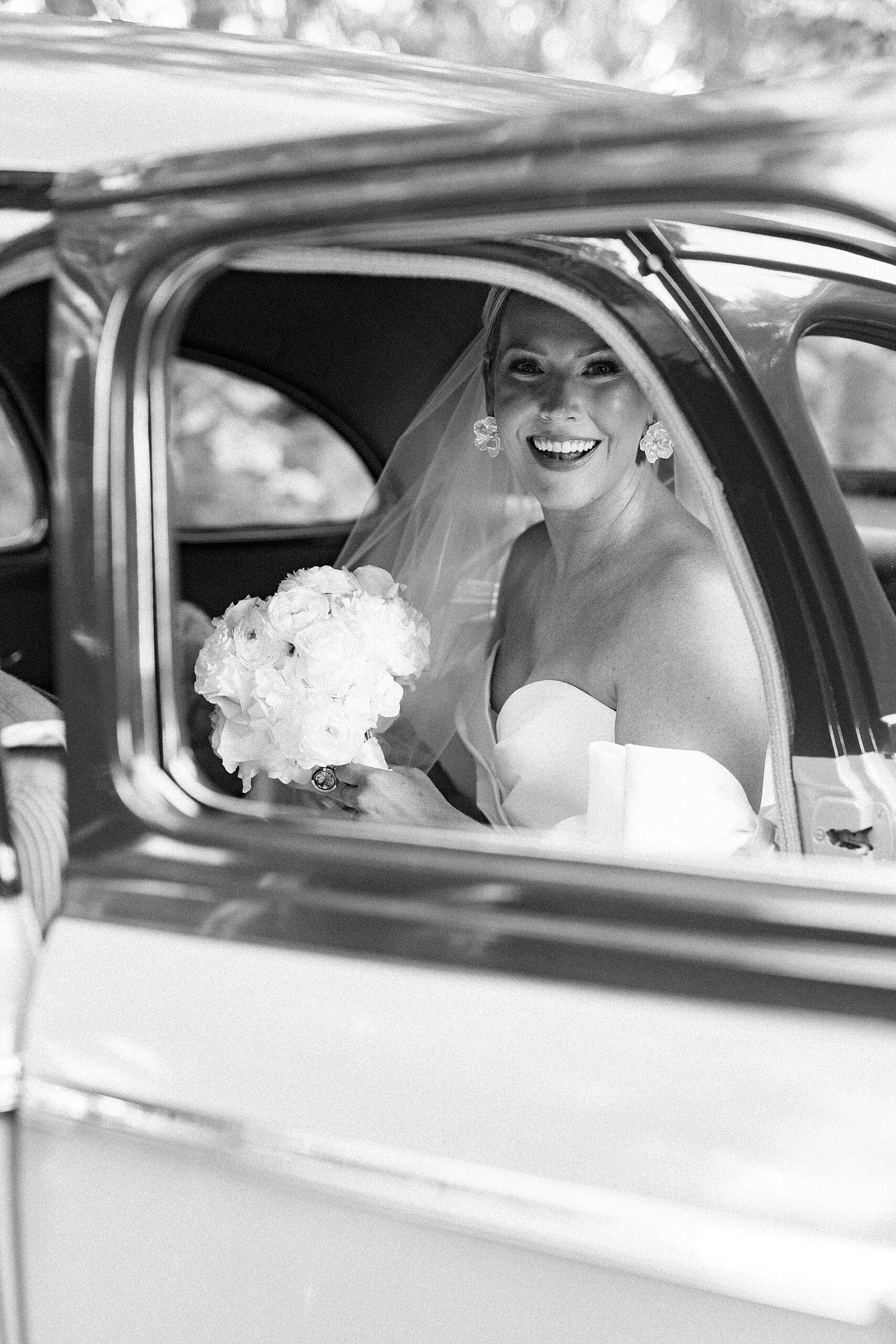 bride in vintage car