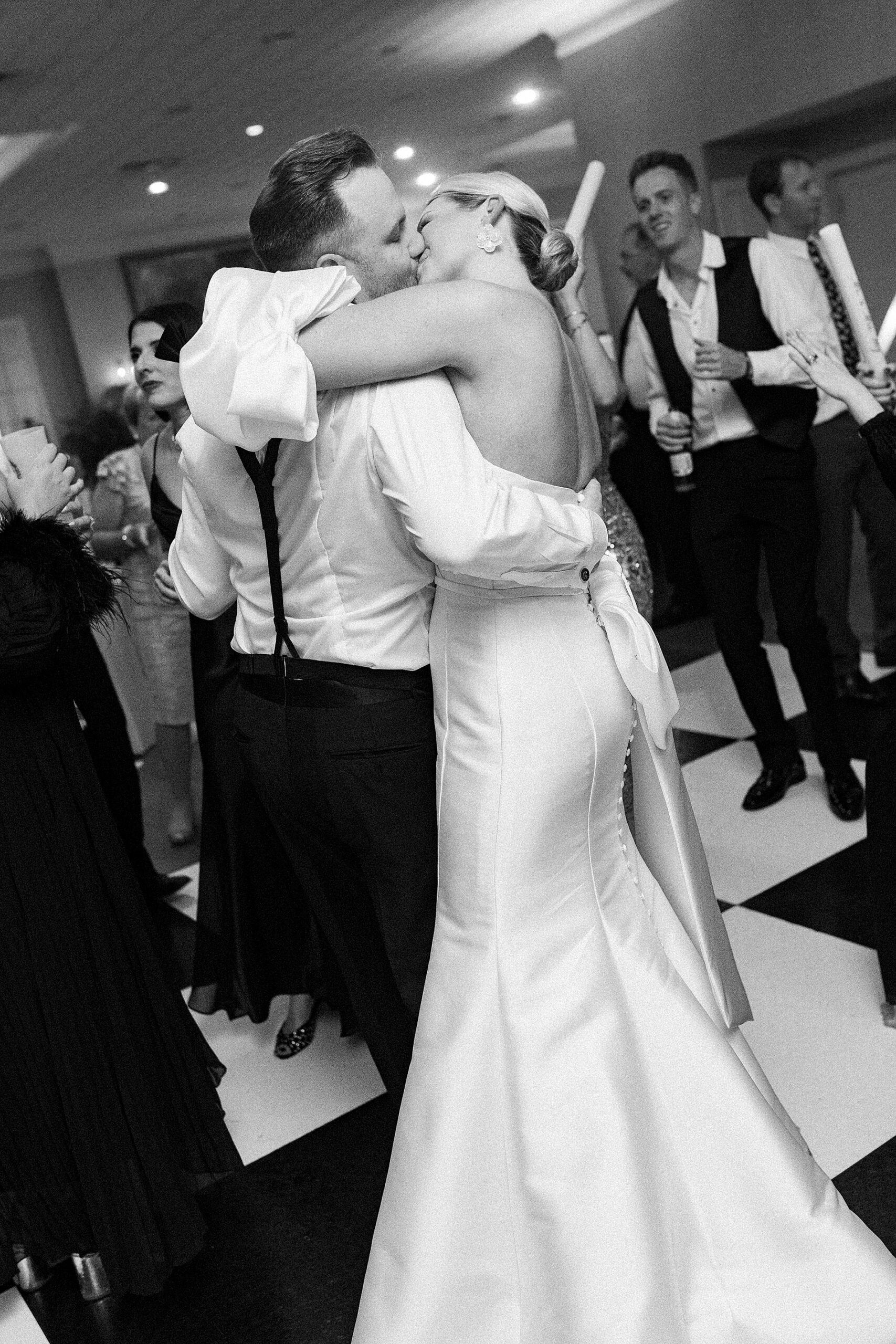 newlyweds kiss on dance floor