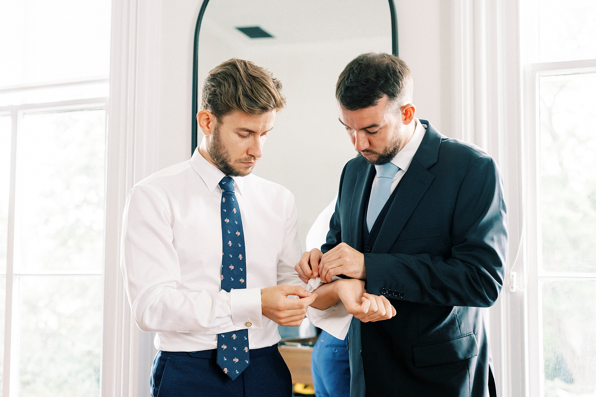 groom getting ready with groomsmen 