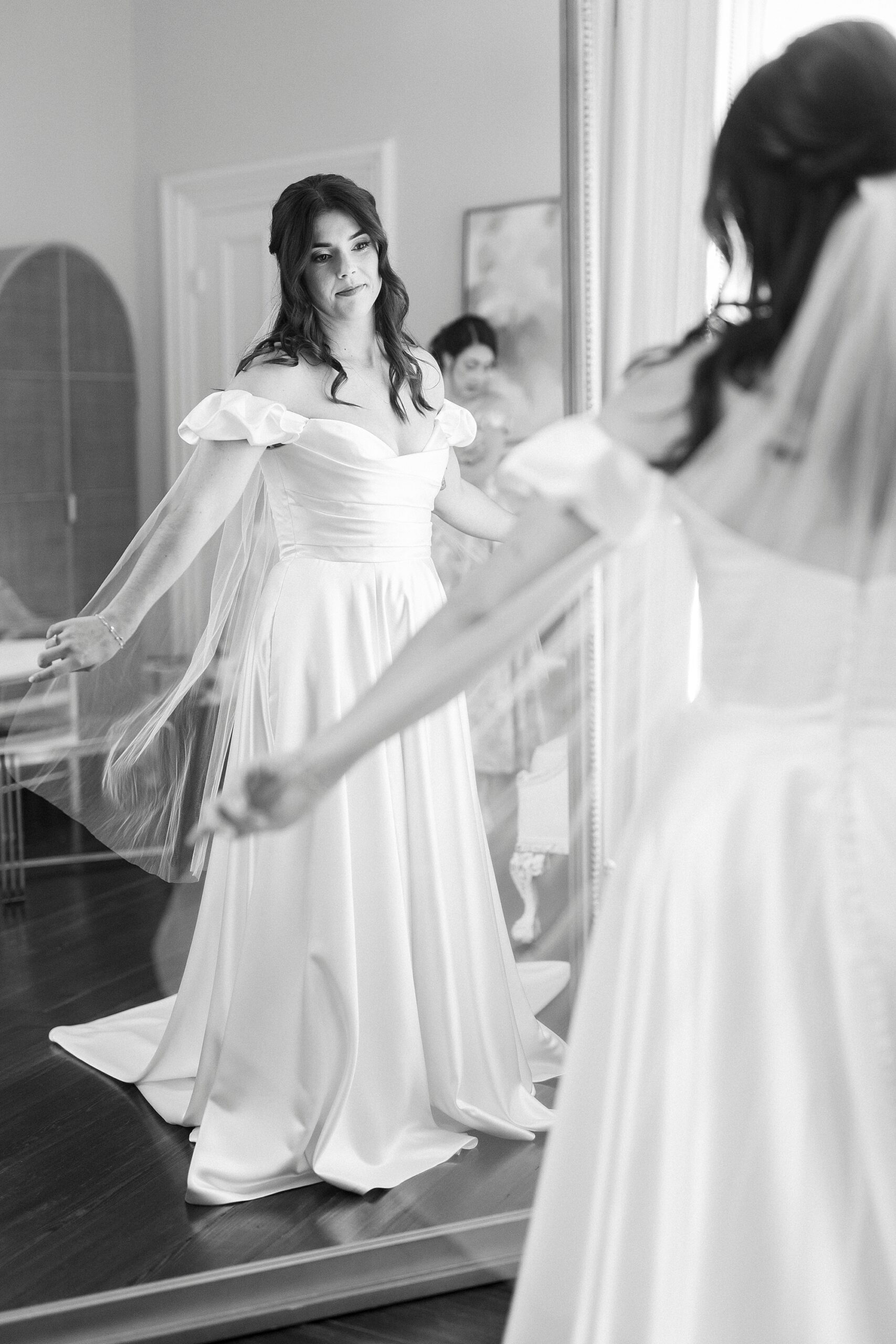 bride looking in mirror 