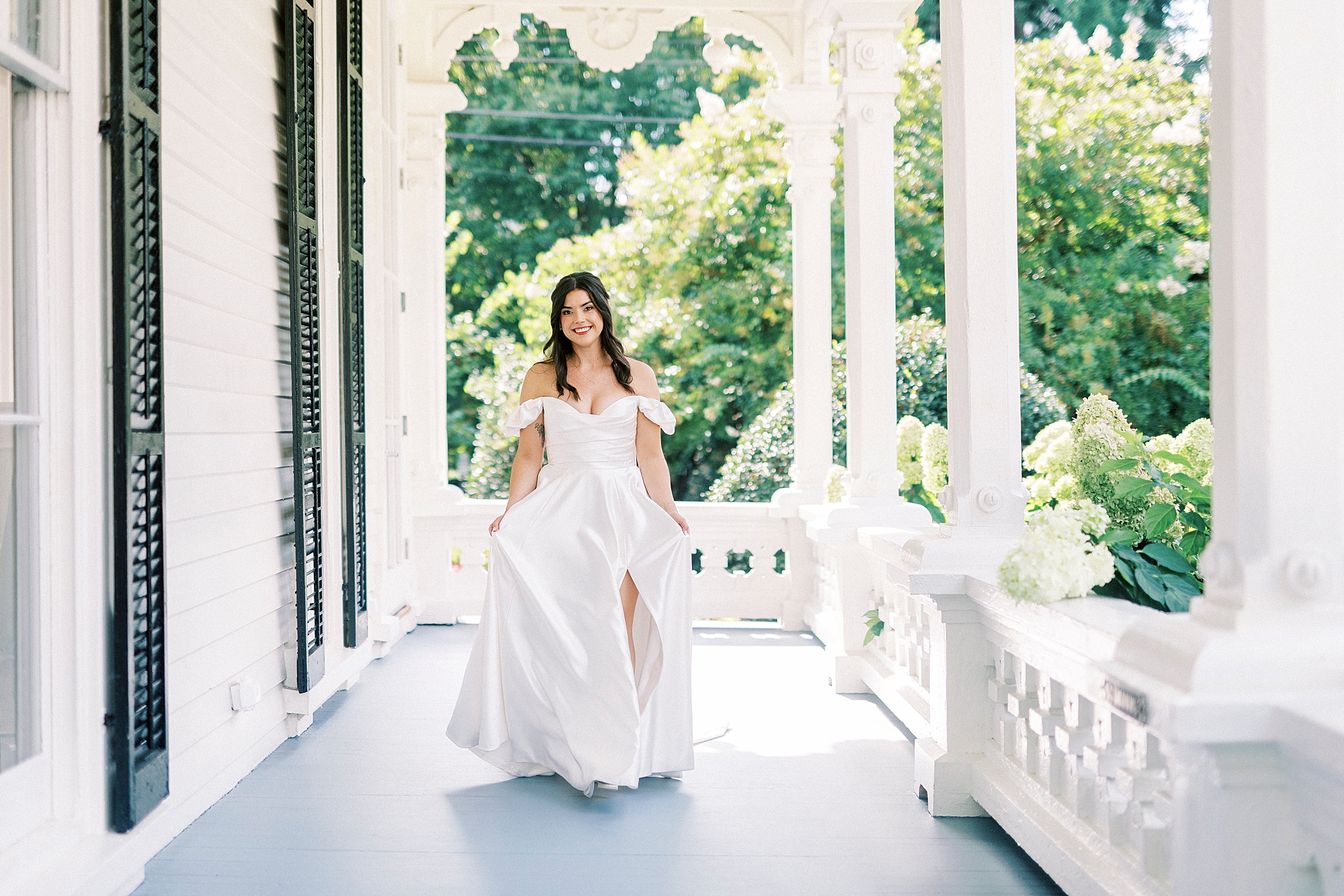 bride in beautiful off shoulder wedding dress with leg slit 