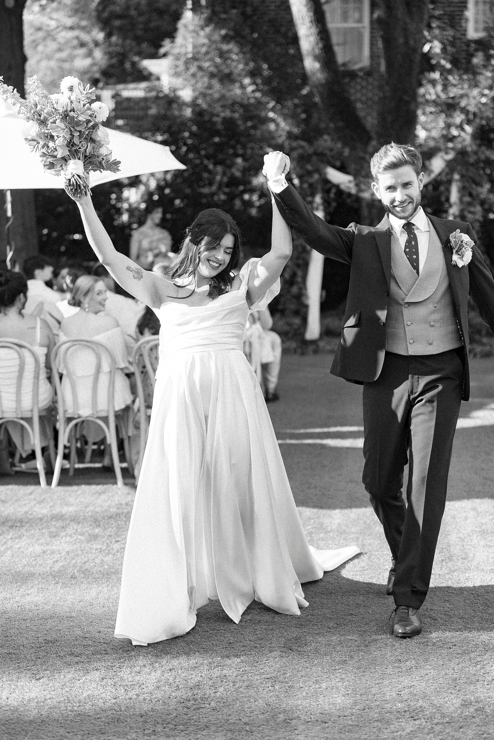 newlyweds exit wedding ceremony 