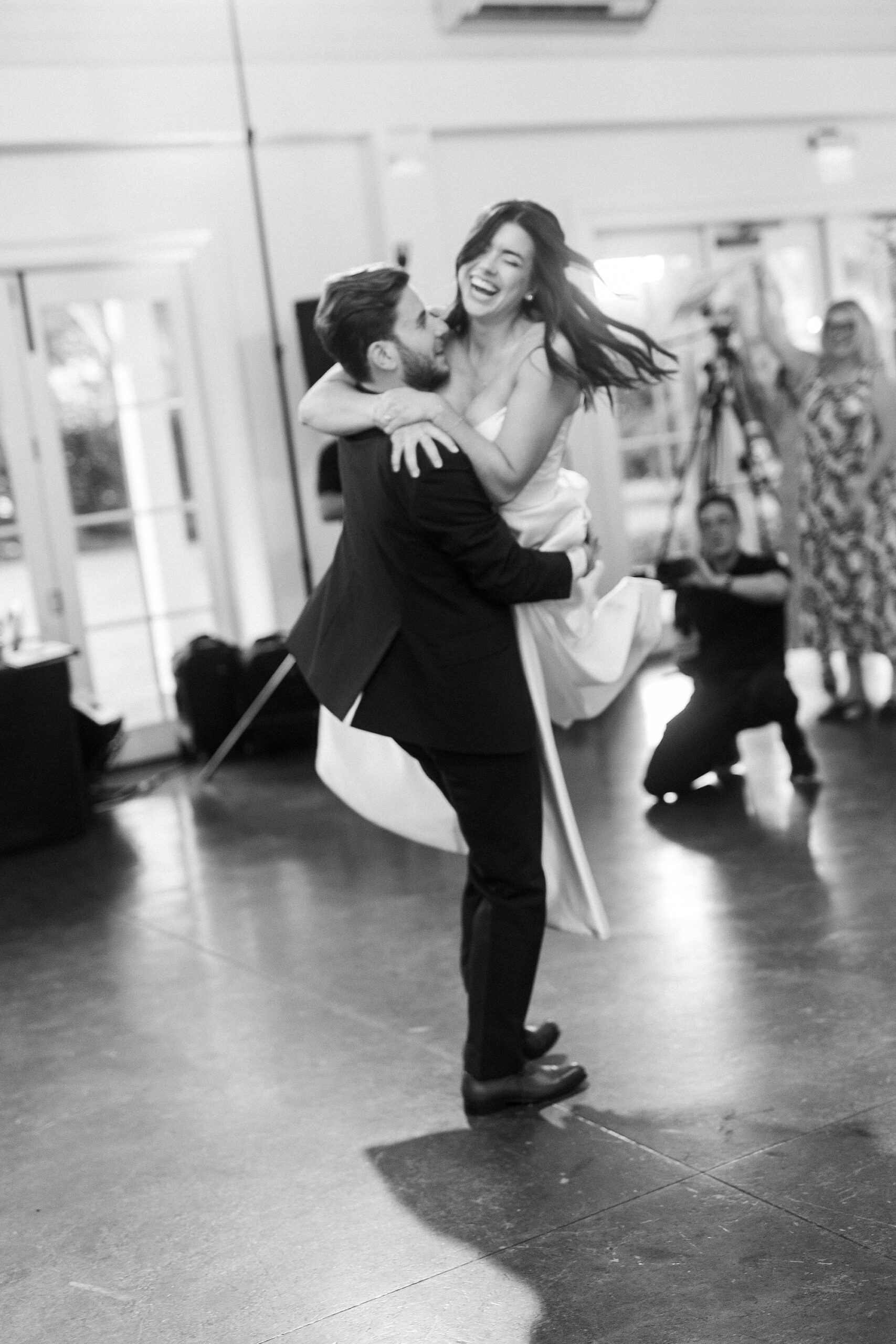 candid portraits of bride and groom at wedding reception in Raleigh NC