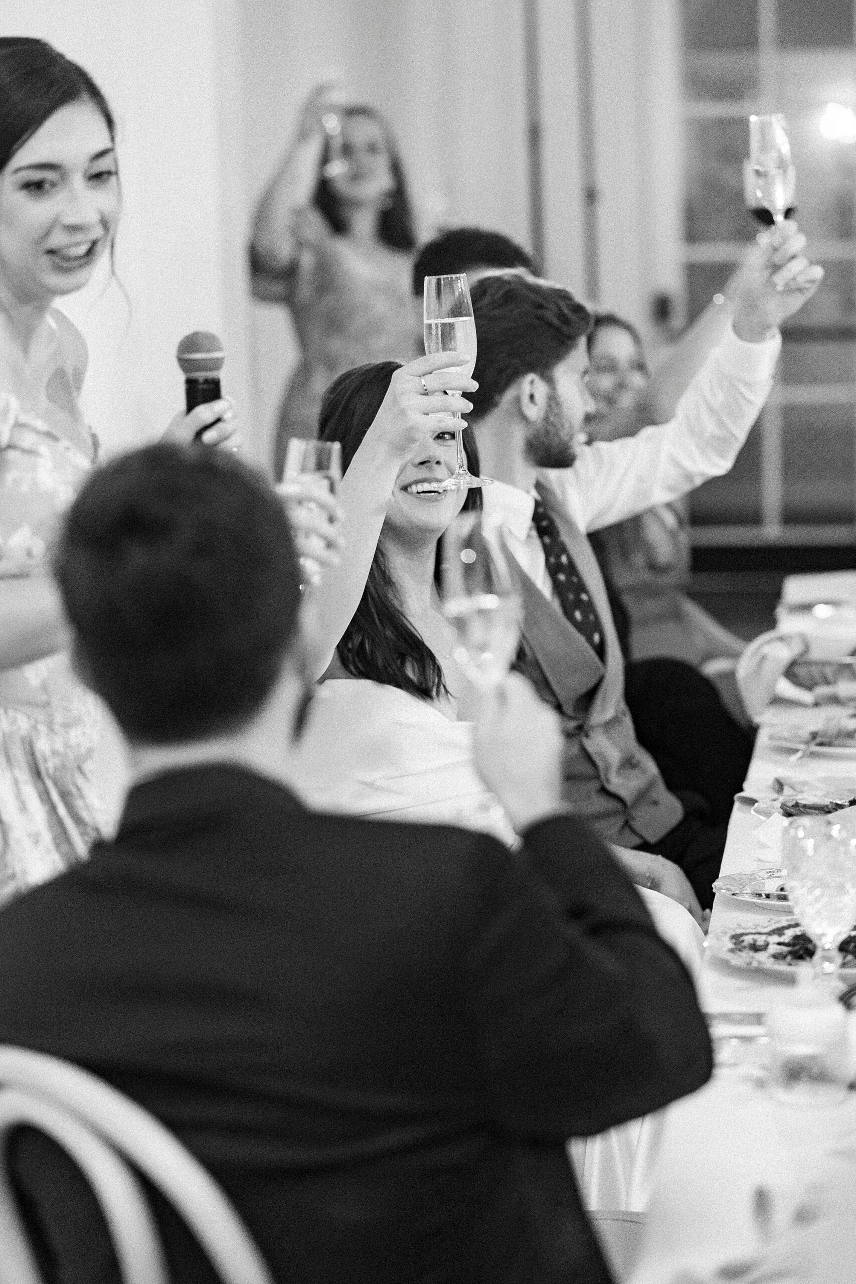 everyone toasts the newlyweds 