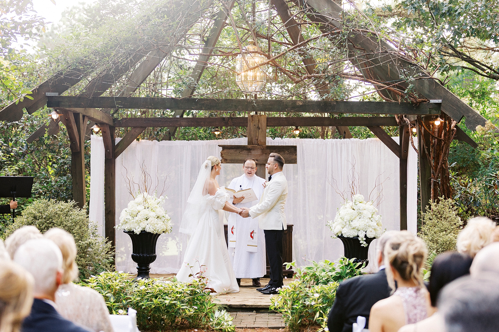bride and groom exchange vows