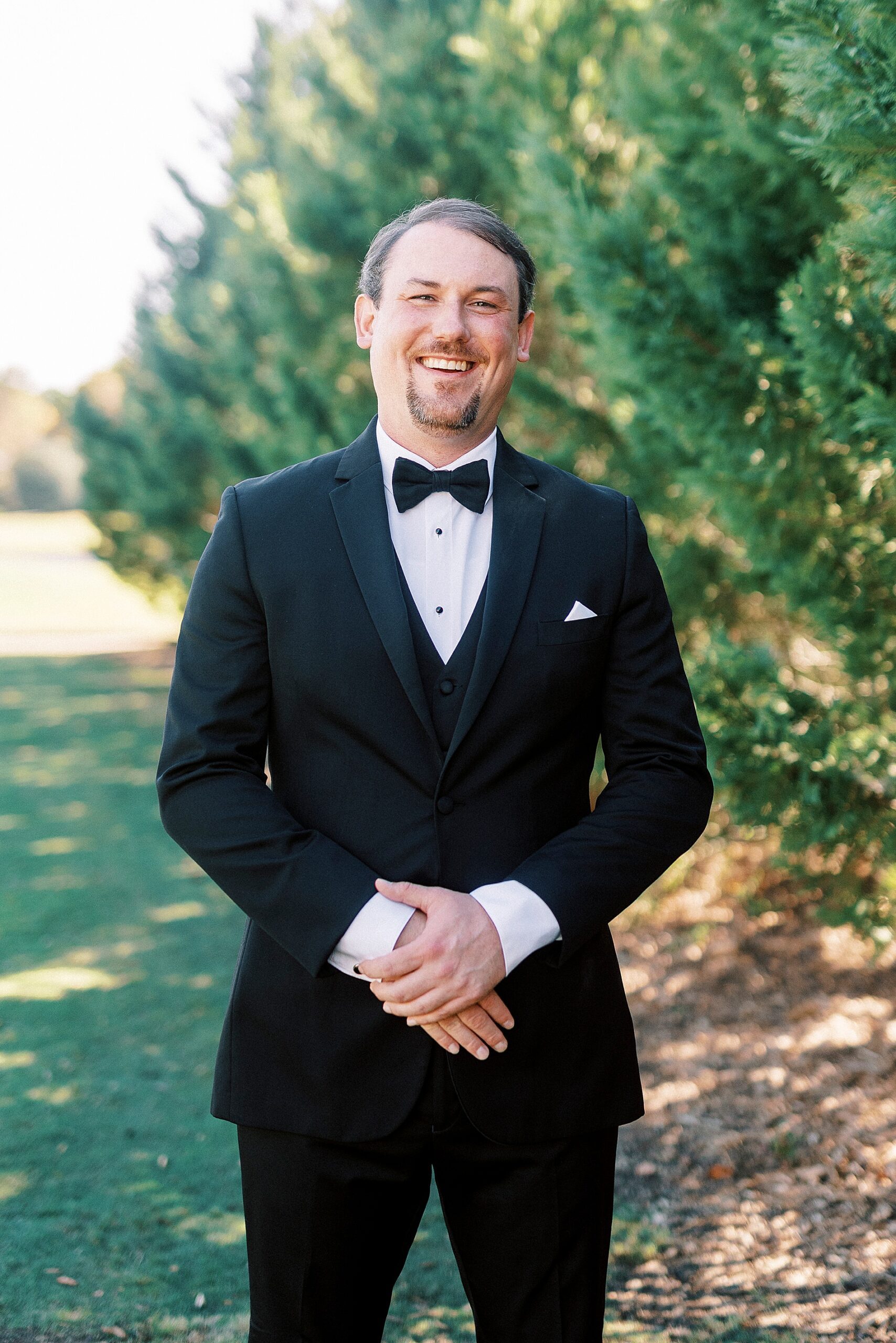 groom portraits from fall wedding at Providence Country Club  